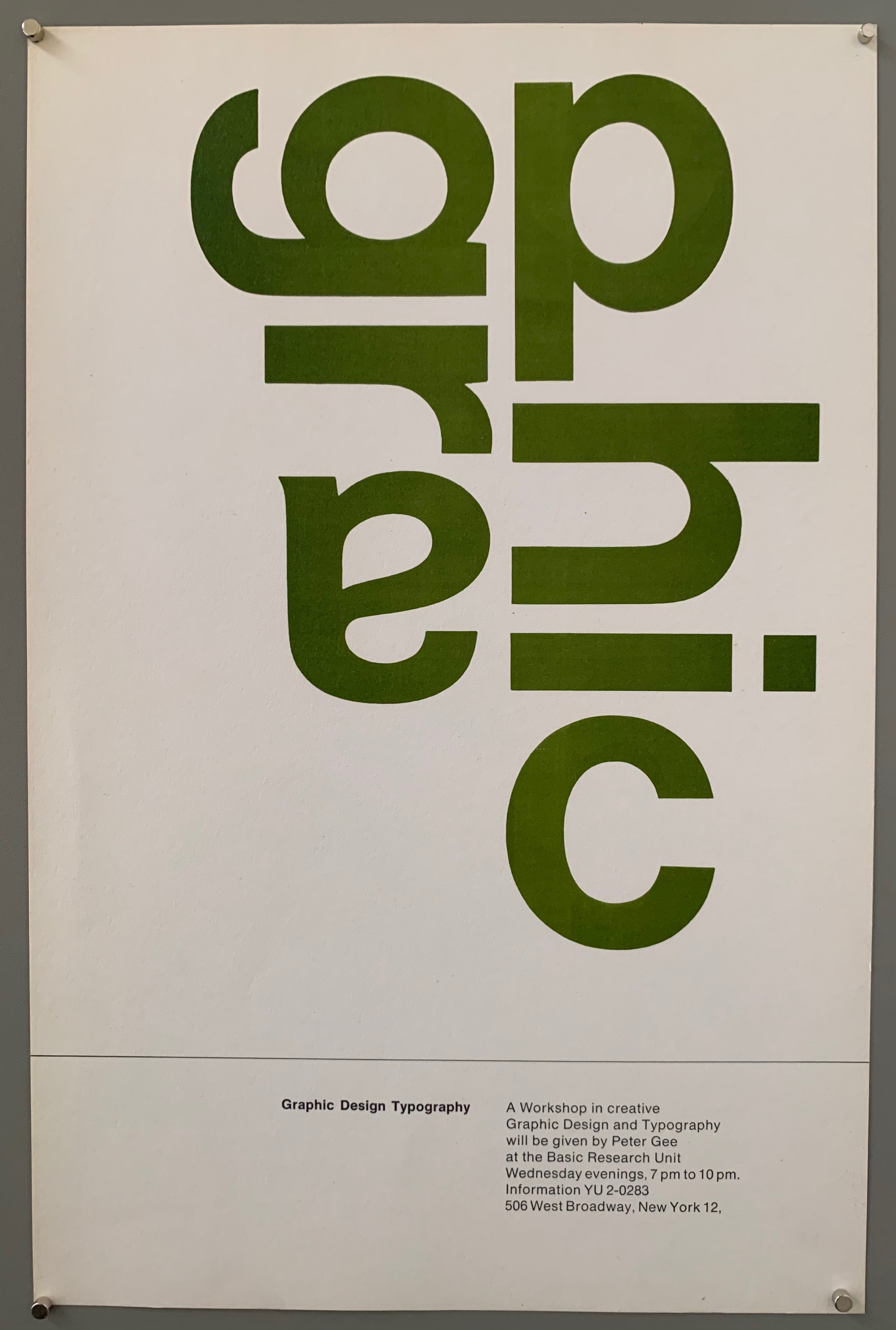 Poster with the word graphic in green typeface