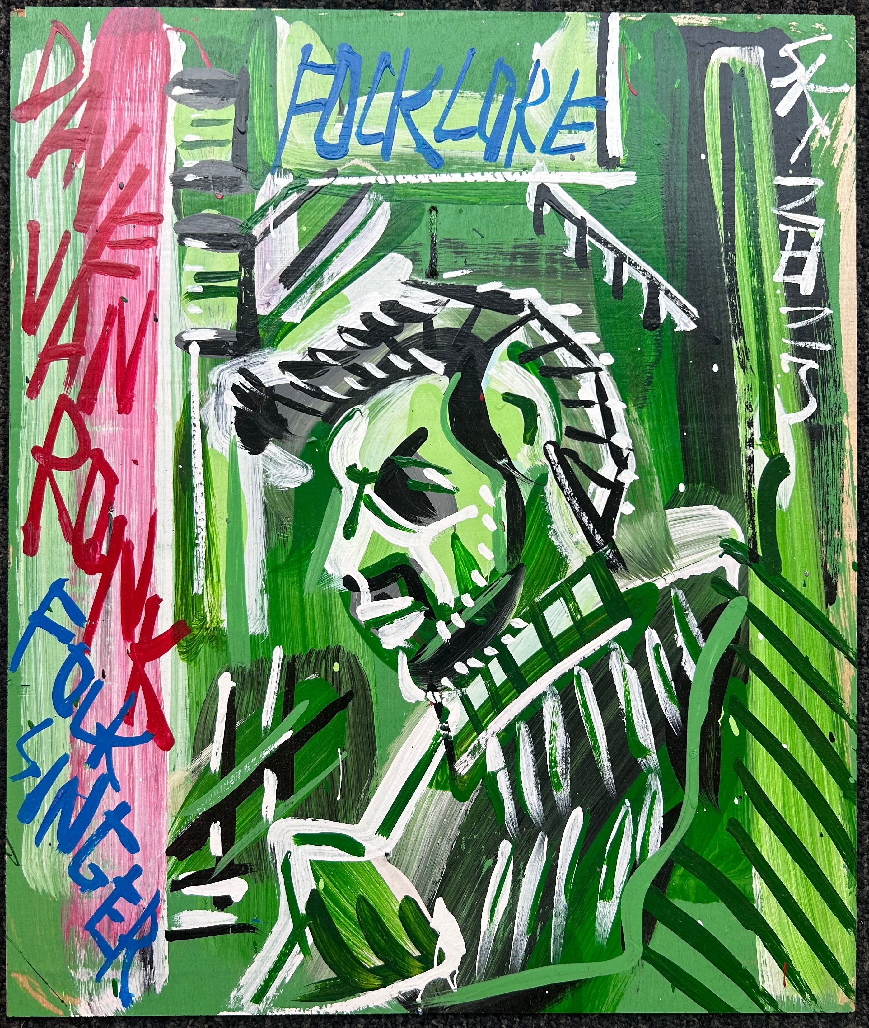 A plank of wood is painted with green as the background, with the portrait outlined in white and black. The text is all caps in blue and red. Steve Keene's signature is written in white.