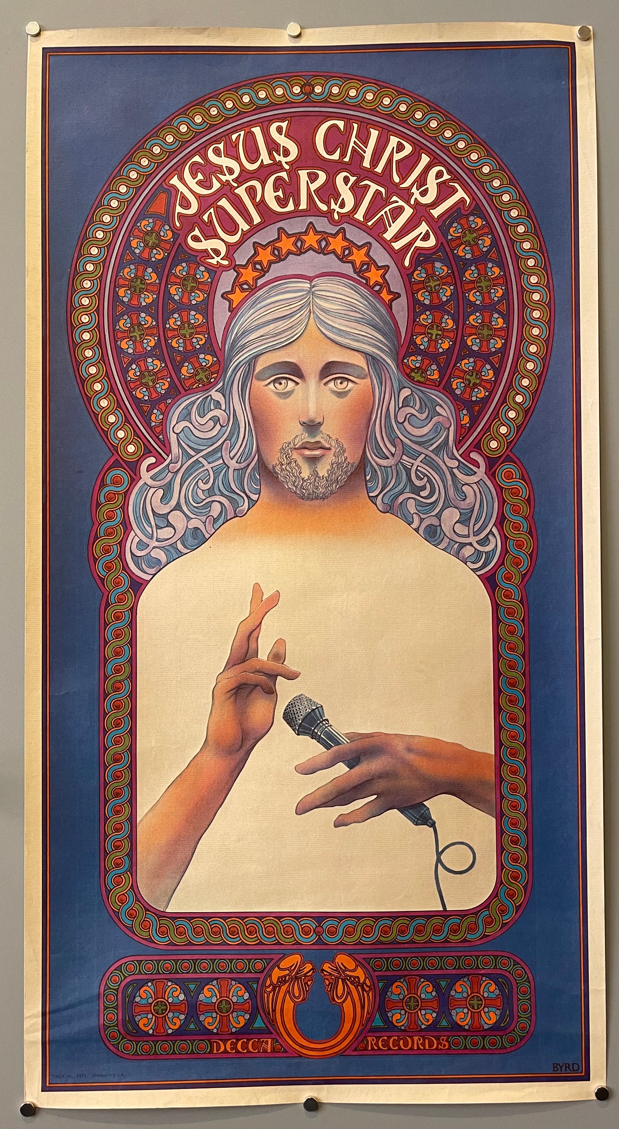 poster of Jesus with a microphone