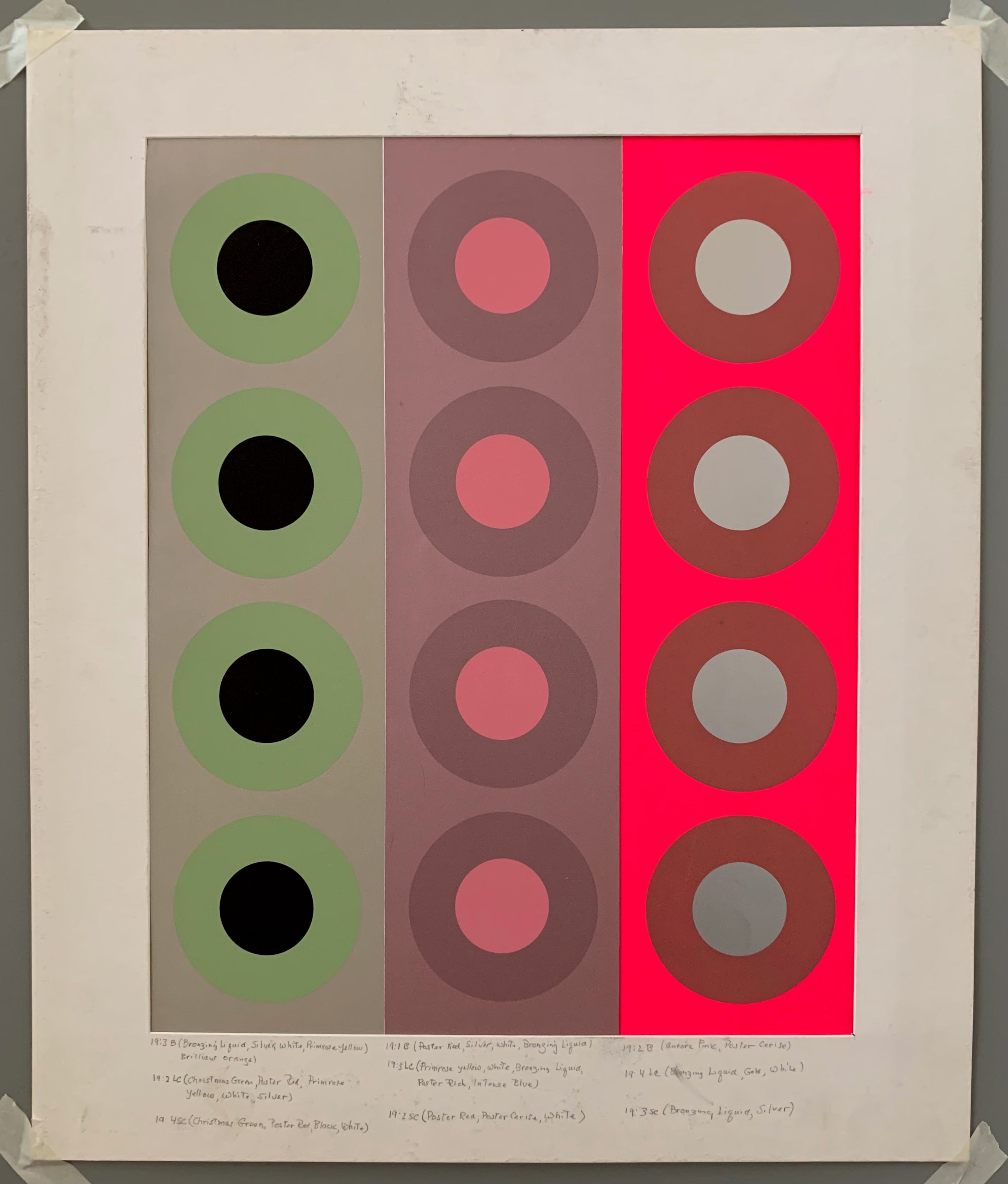 Three columns of targets are side by side in a rectangle. A white matted border is on them.