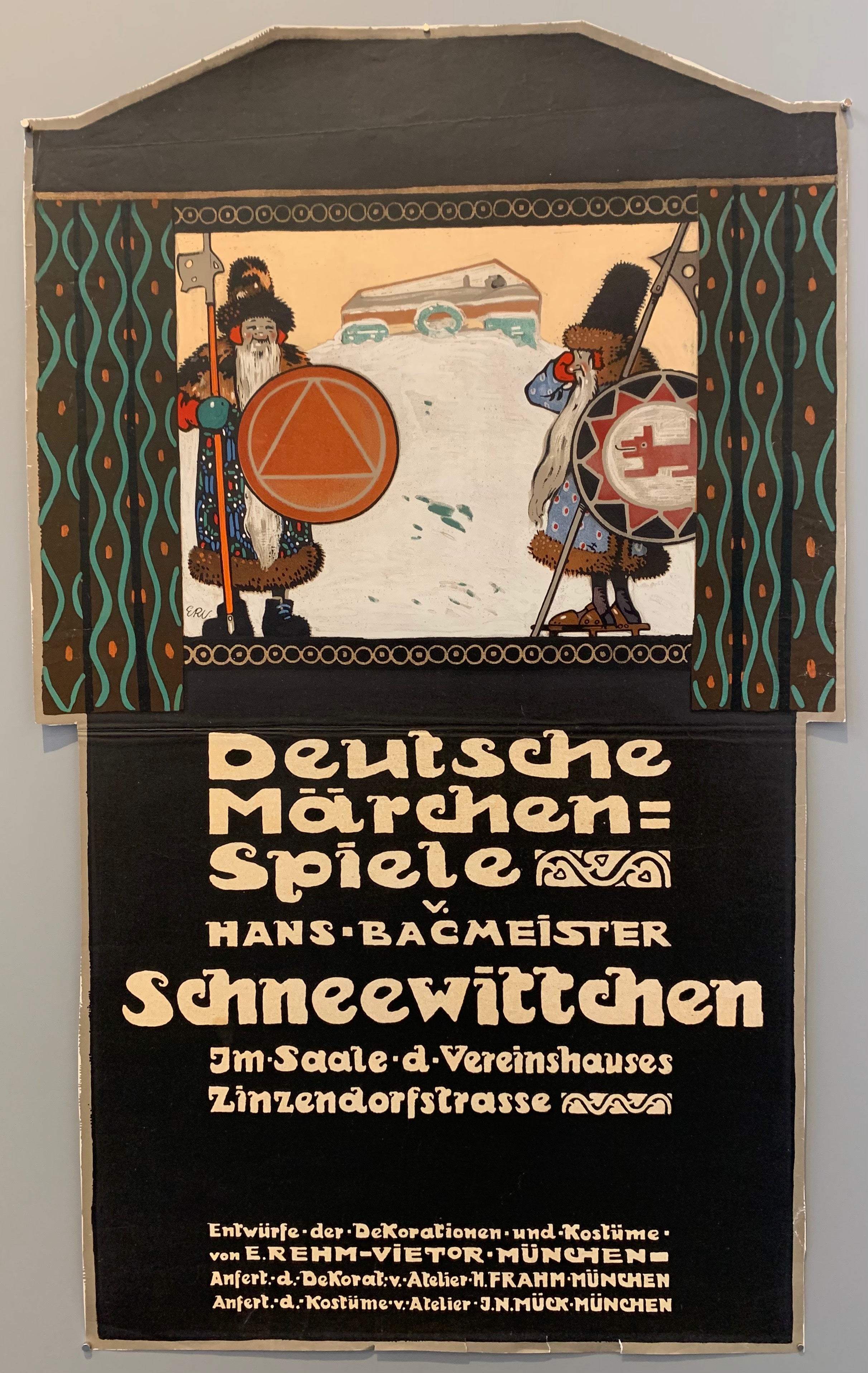 An image of two dwarves holding axes and shields above text.