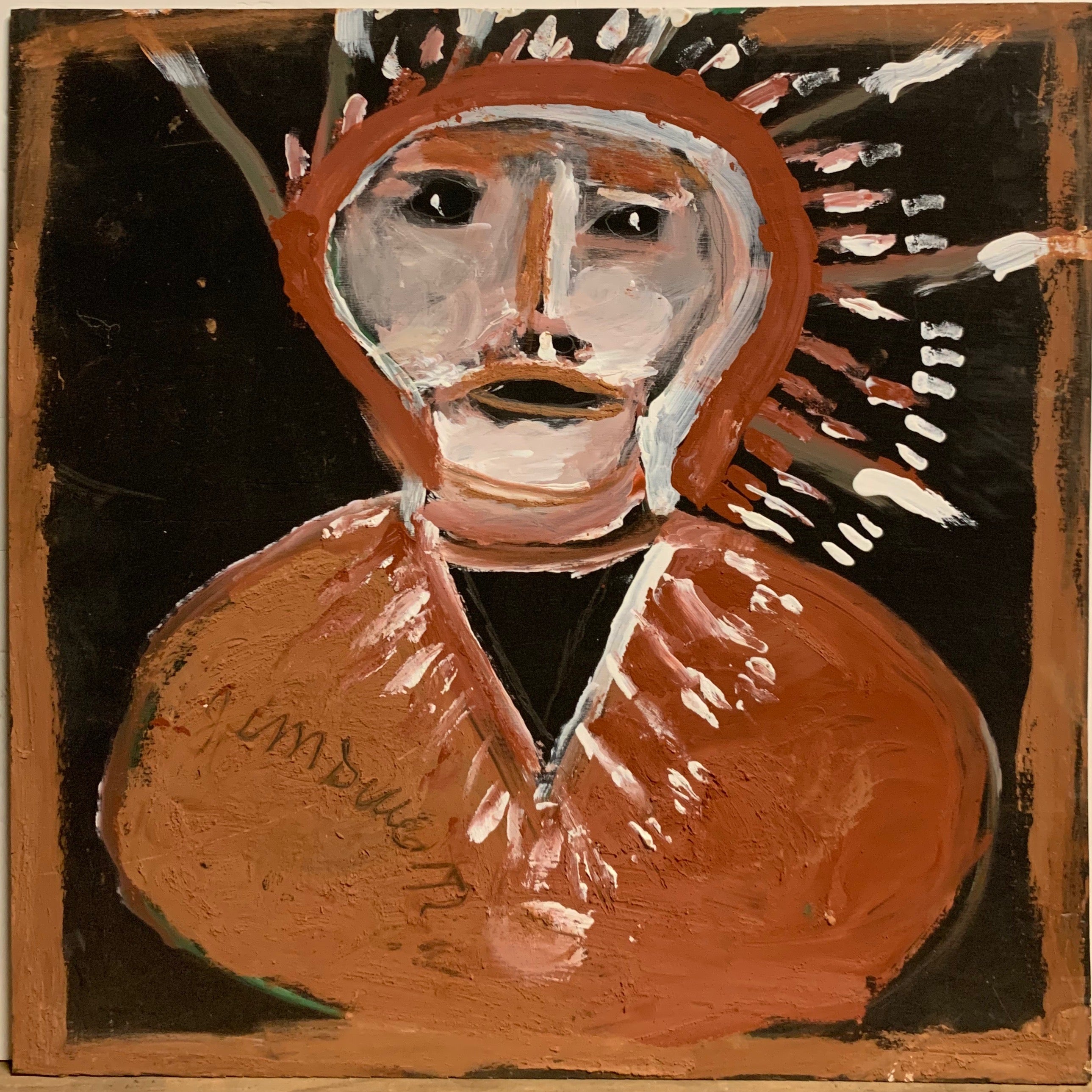 A Jimmie Lee Sudduth painting of a Native American.