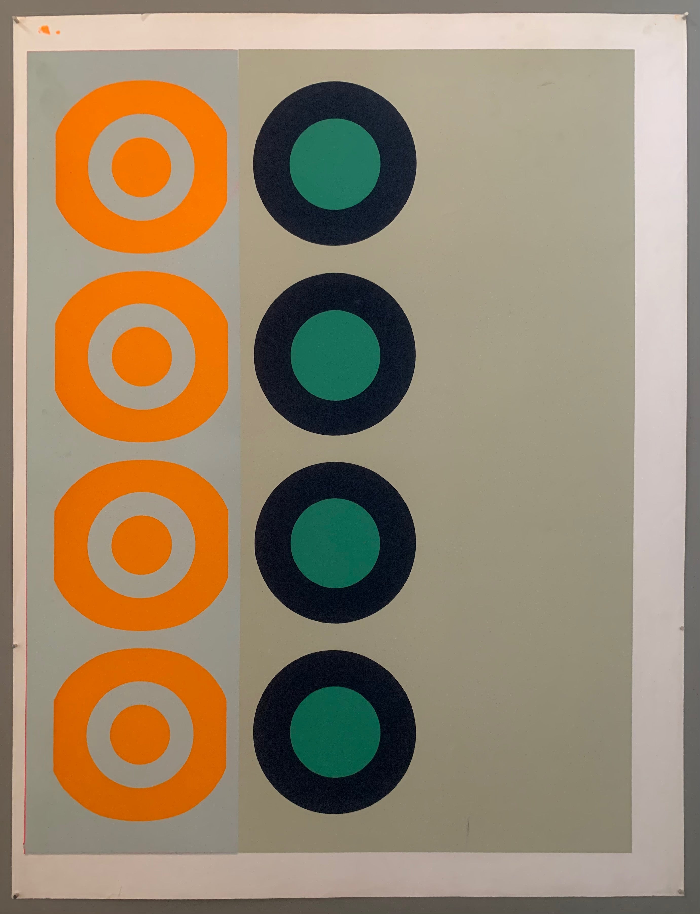 three panels: on the left, a light blue panel with orange targets. In the middle, a  grey panel with black and teal targets. And finally, on the right, a black grey panel.
