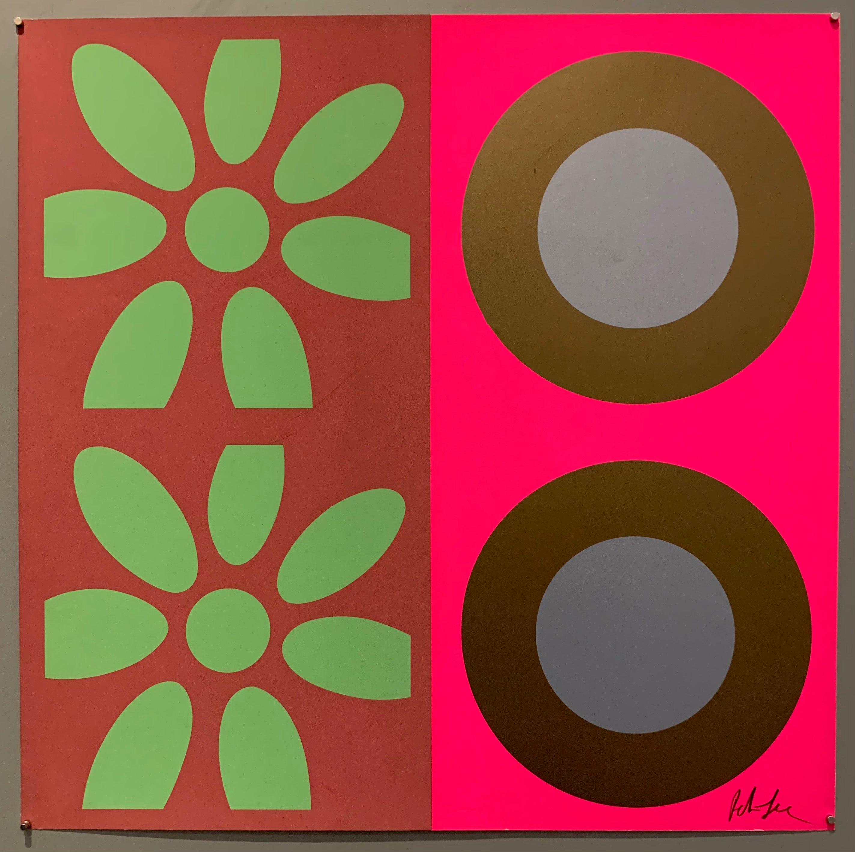 A square of four large motifs on paper. The colors are maroon with mint green flowers, the other is neon pink with brown and purple targets.