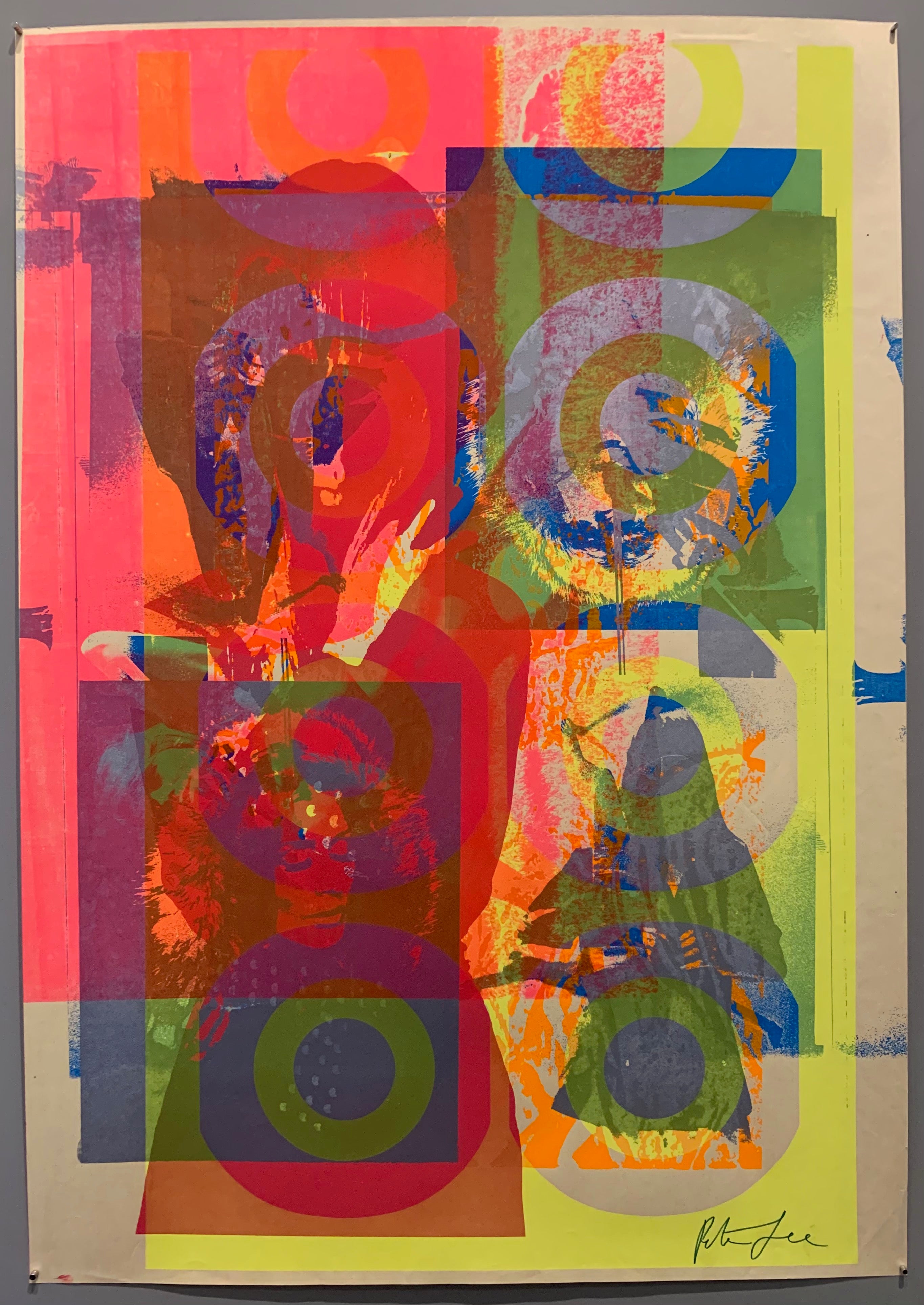 A mix of pop art-style images lay over each other in many neon colors.