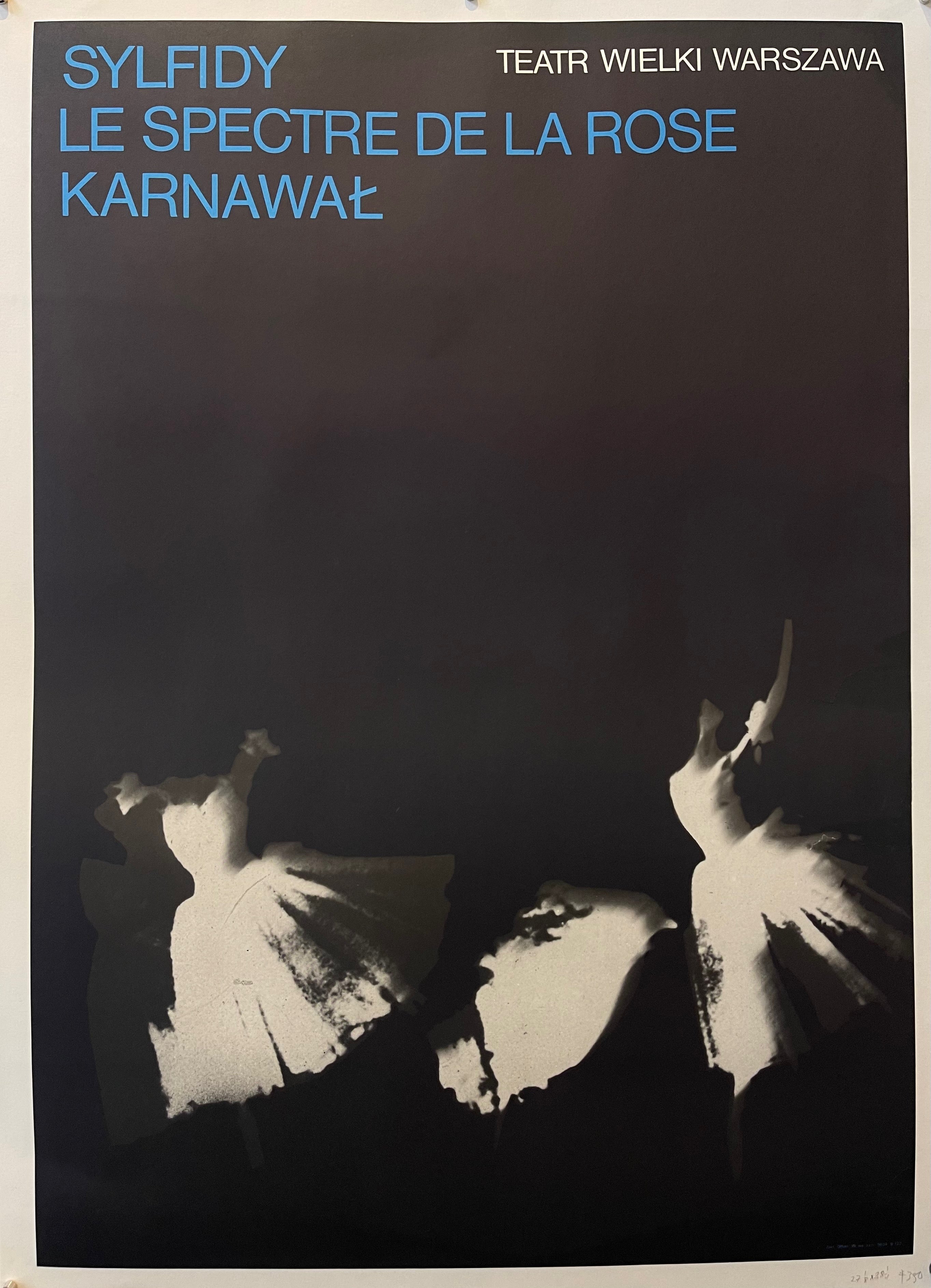 38x27 black and white Polish theater poster featuring blue and white text against a black background. 3 ballerinas in white/grey tones dance on the bottom