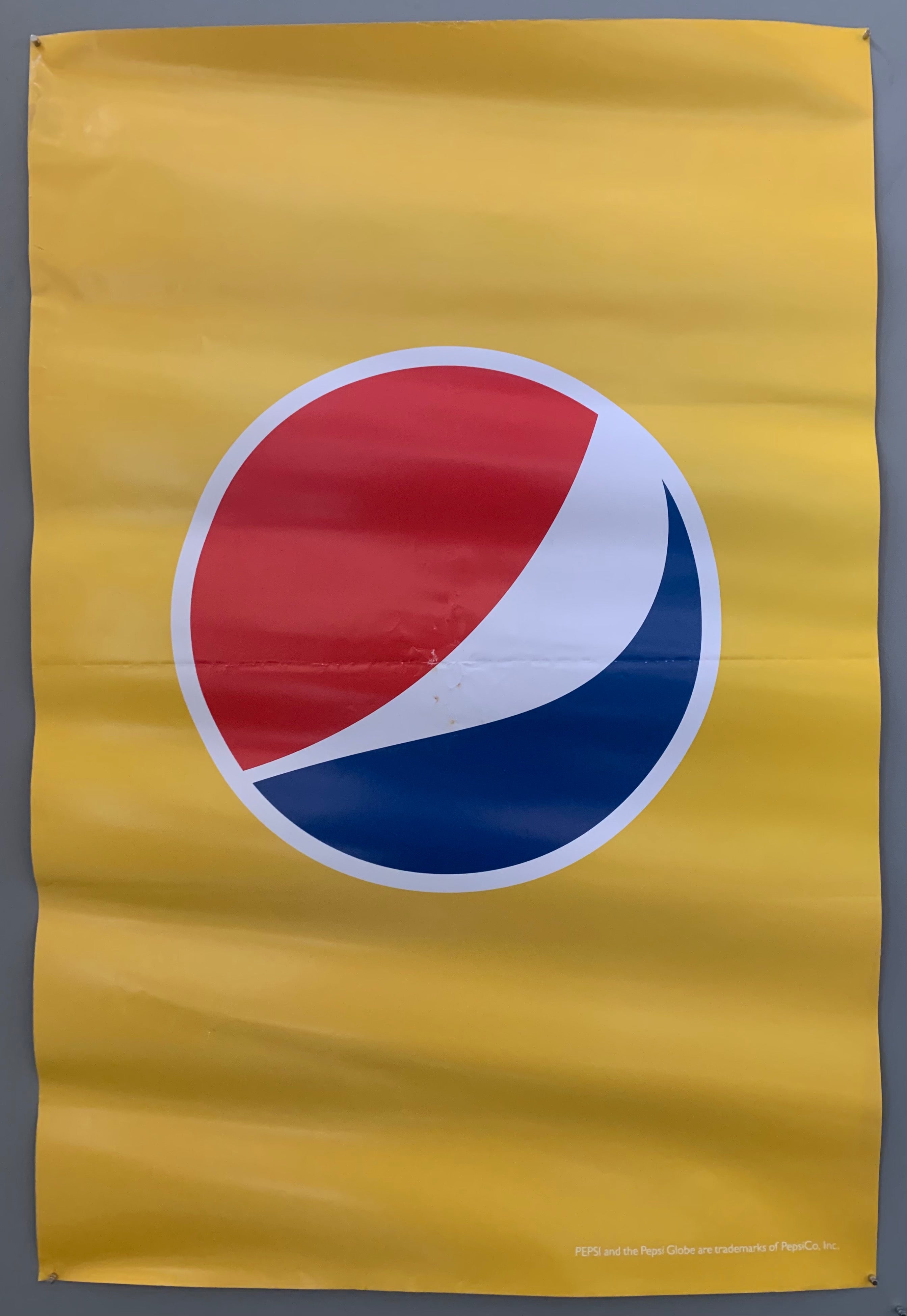 pepsi logo on a yellow background