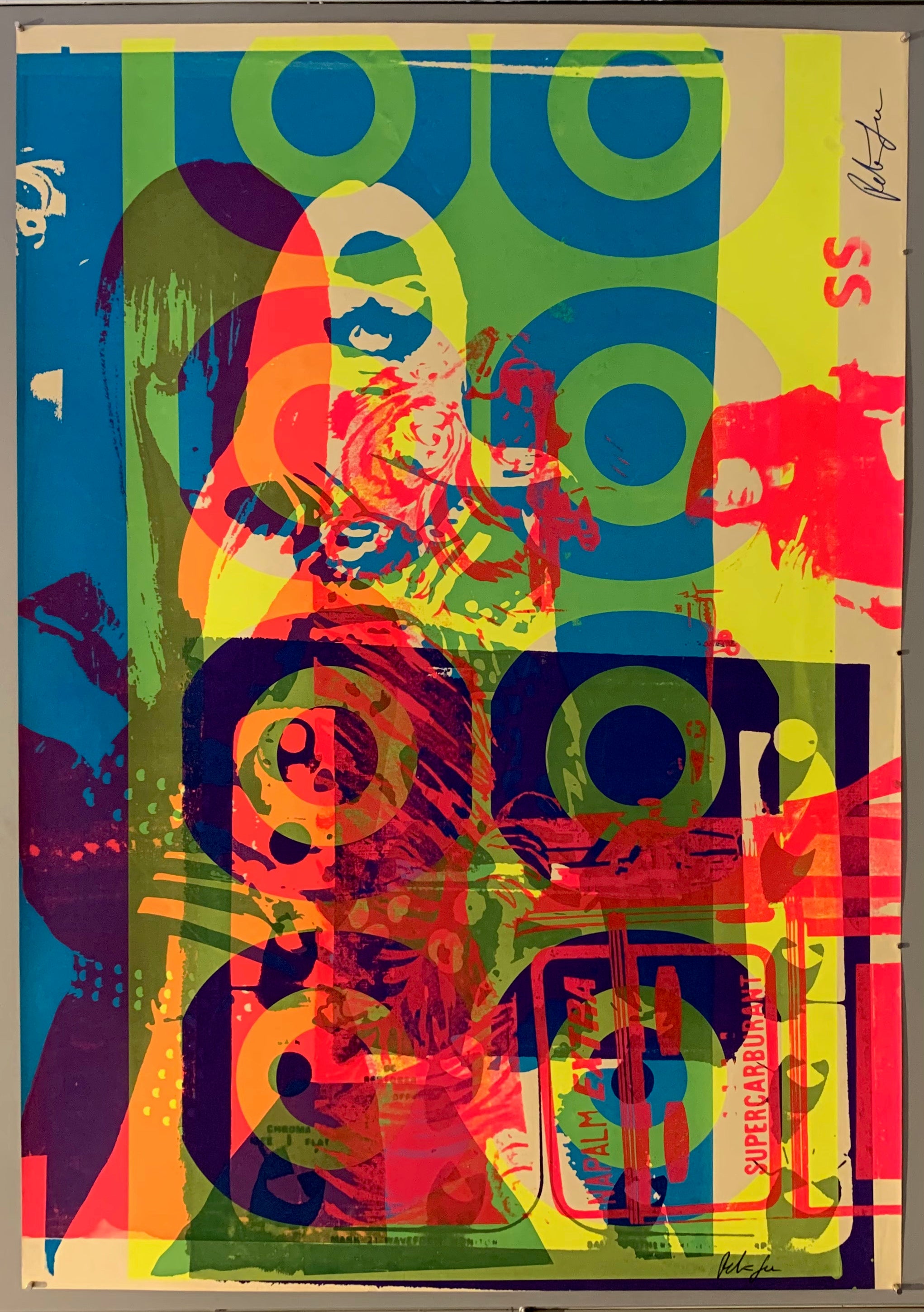 A mix of pop art-style images lay over each other in many neon colors.