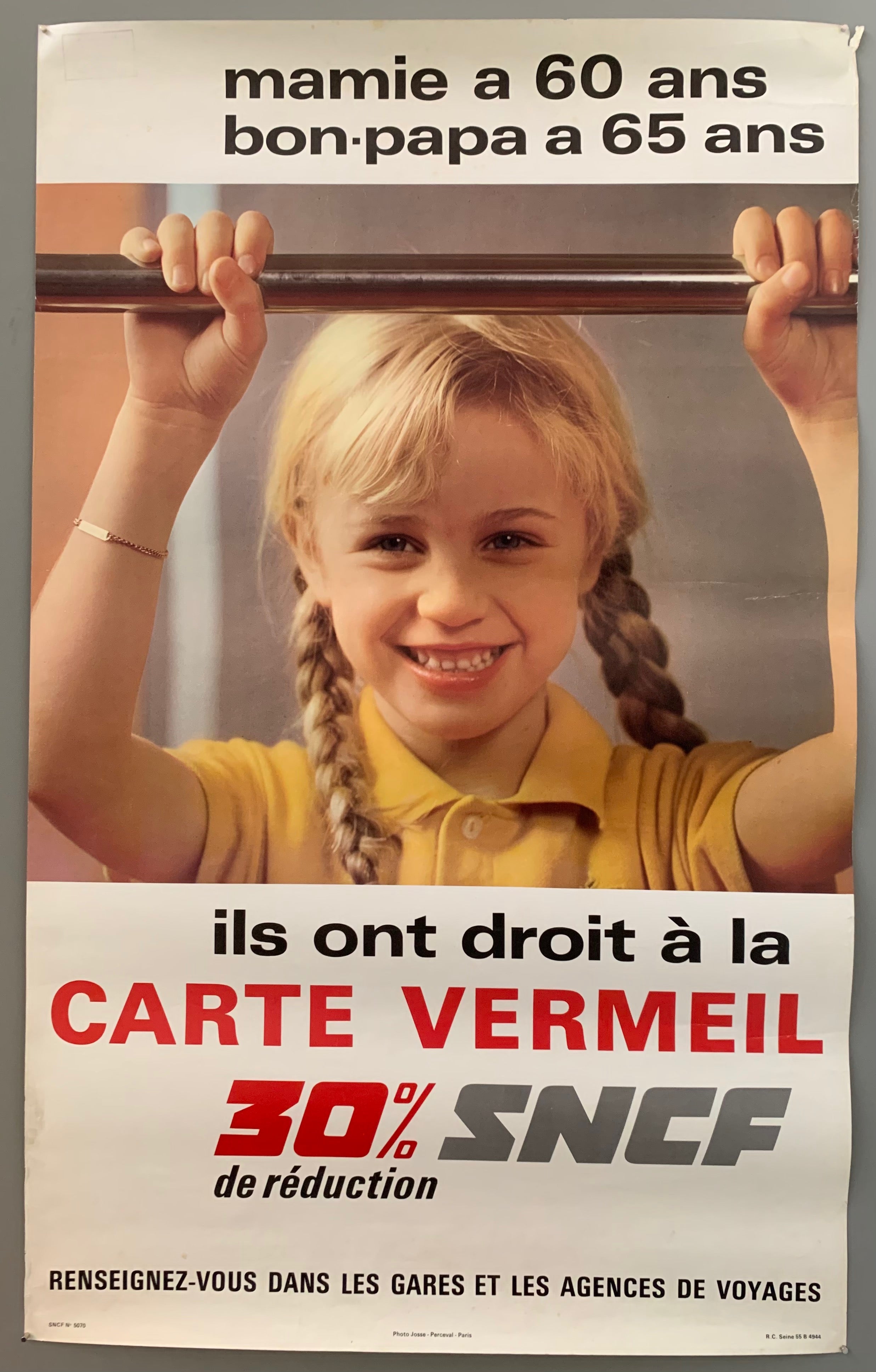 Poster featuring a photograph of a little girl with blonde, braided pigtails