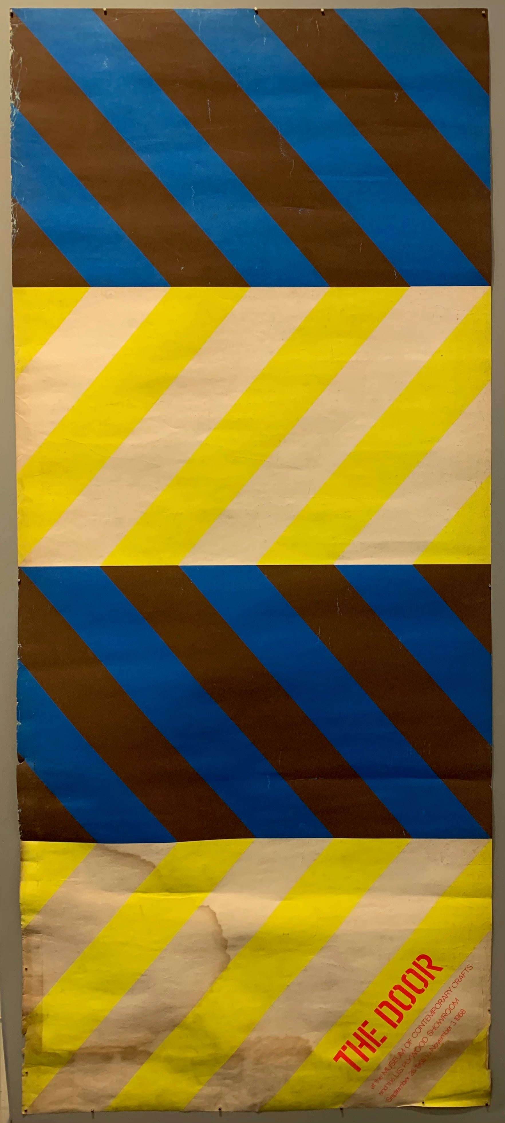 This mix of multicolored diagonals is eye-catching and bold and creates a chevron print. The main colors are yellow and white and black and blue.