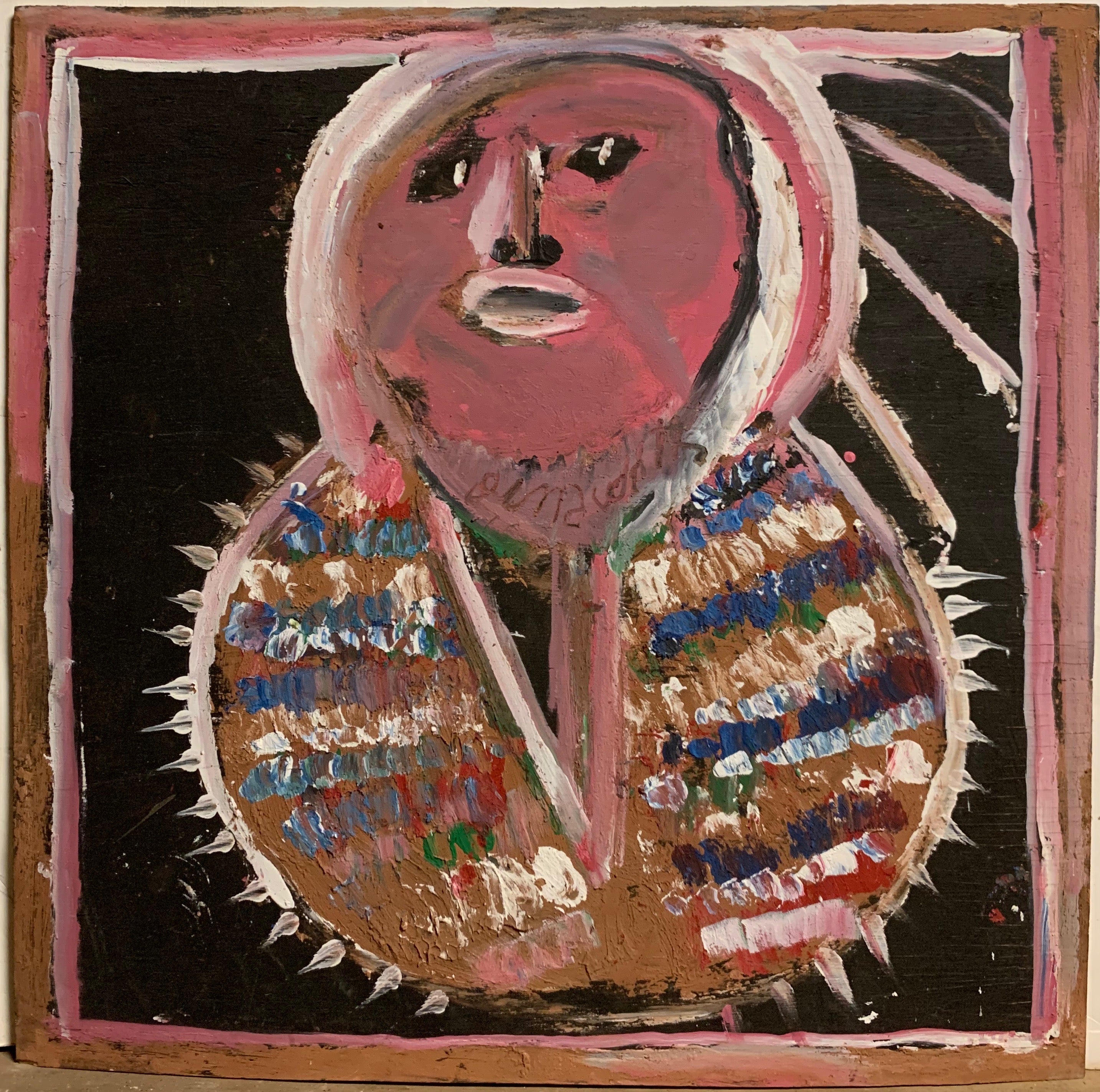 A Jimmie Lee Sudduth painting of a Native American.