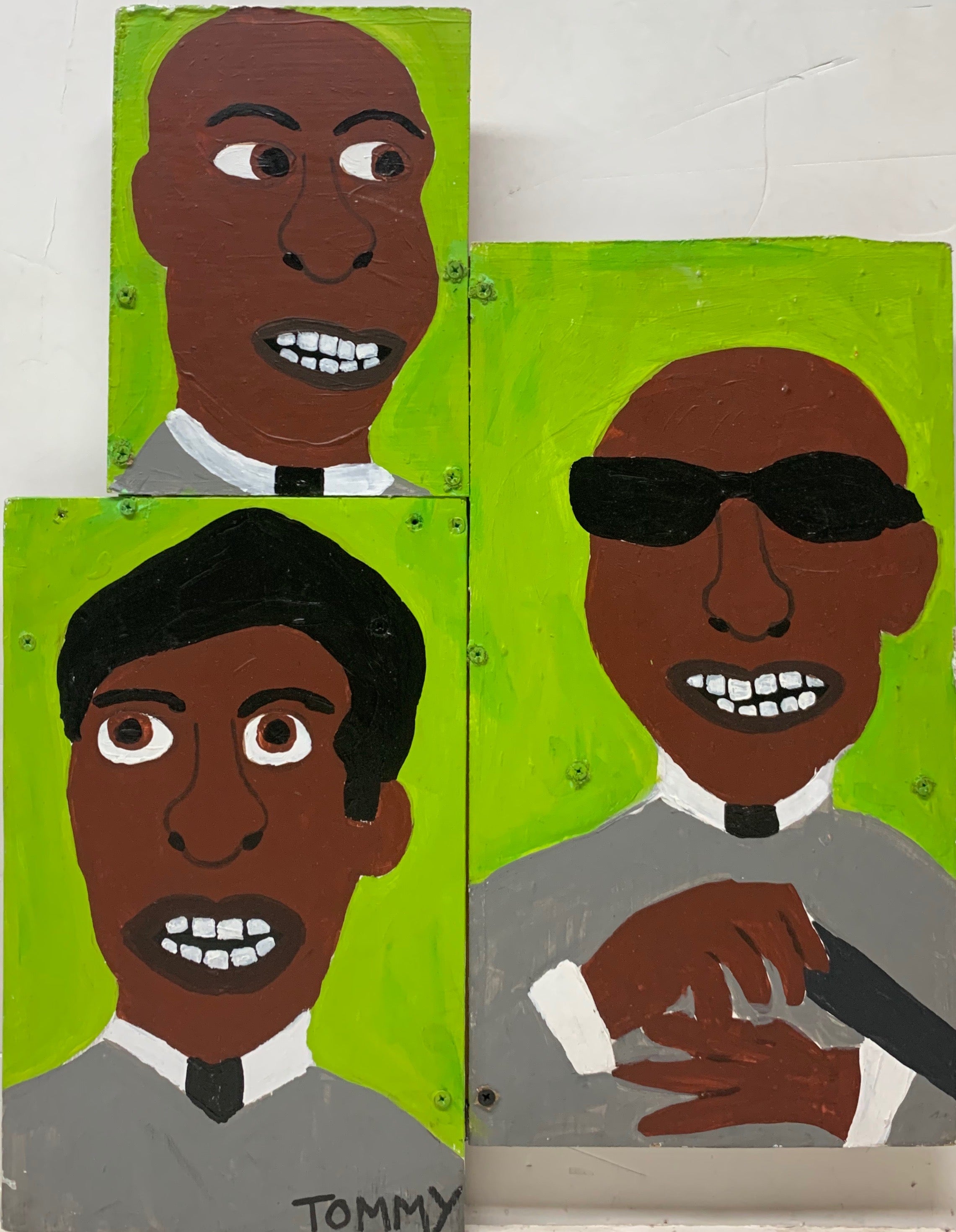 Tommy Cheng portrait of Screamin Jay Hawkins, Fats Domino, and Stevie Wonder, all painted on a lime green background.