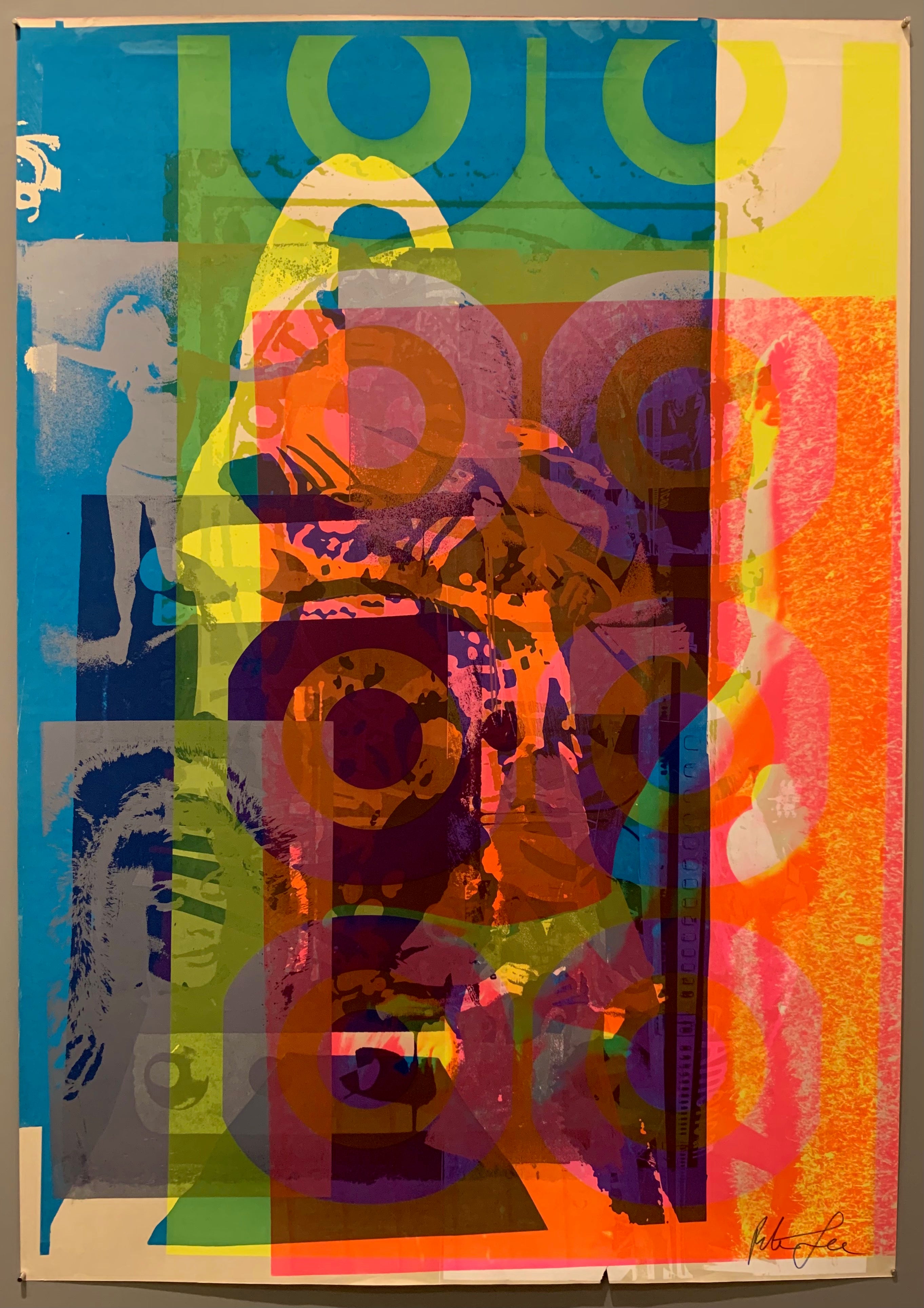 A mix of pop art-style images lay over each other in many neon colors.