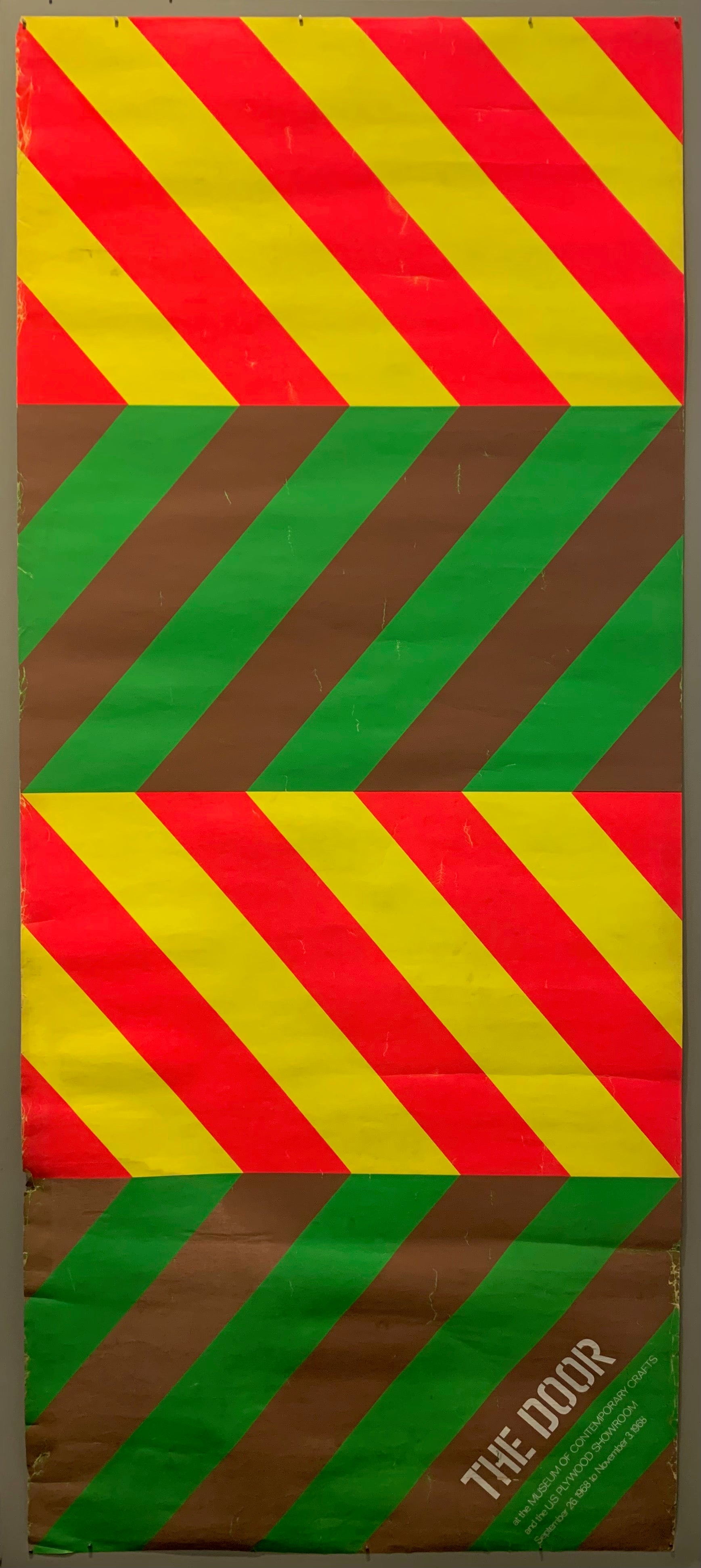This mix of multicolored diagonals is eye-catching and bold and creates a chevron print. The main colors are yellow and pink and grey and green.