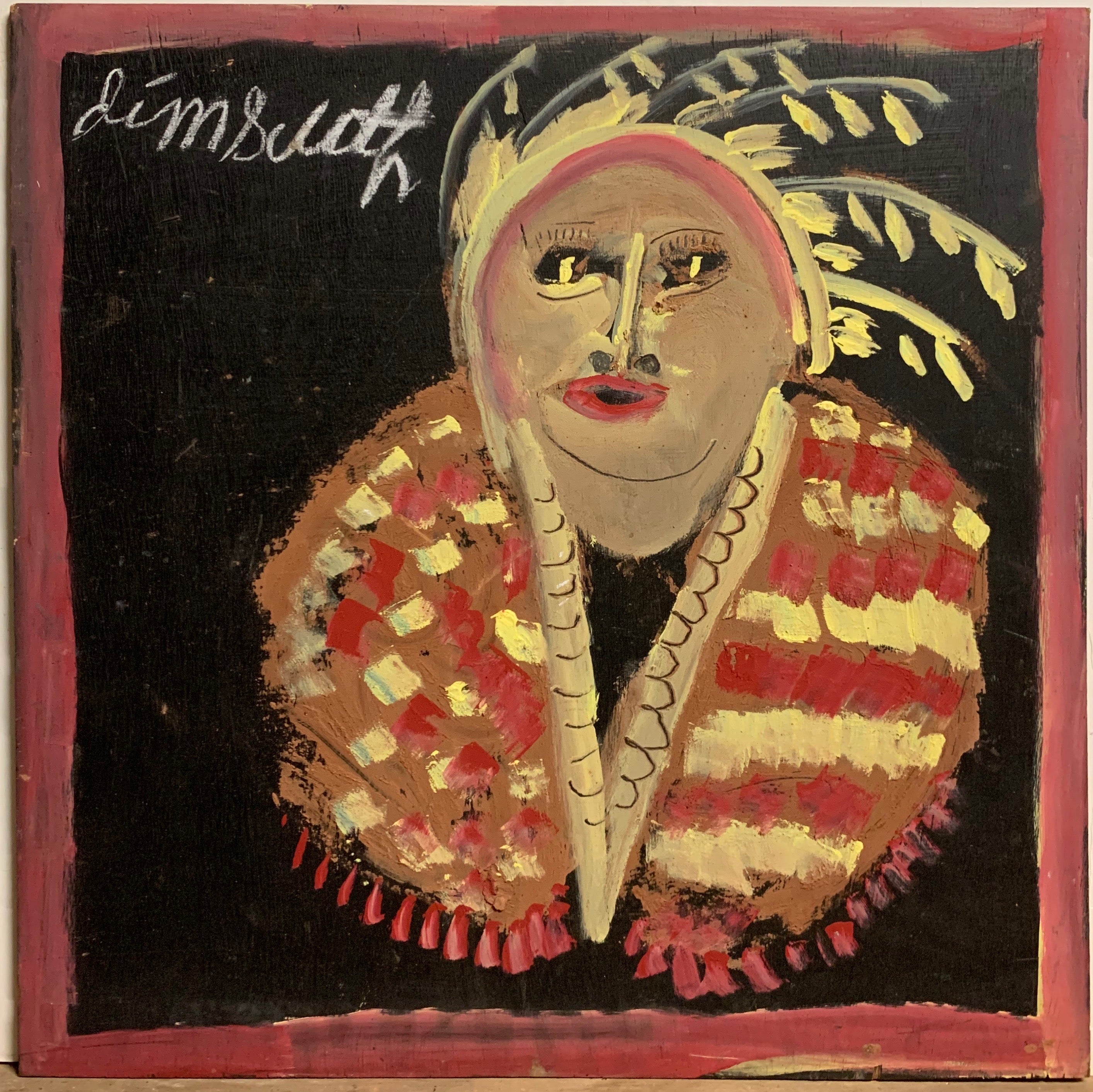 A Jimmie Lee Sudduth painting of a Native American.