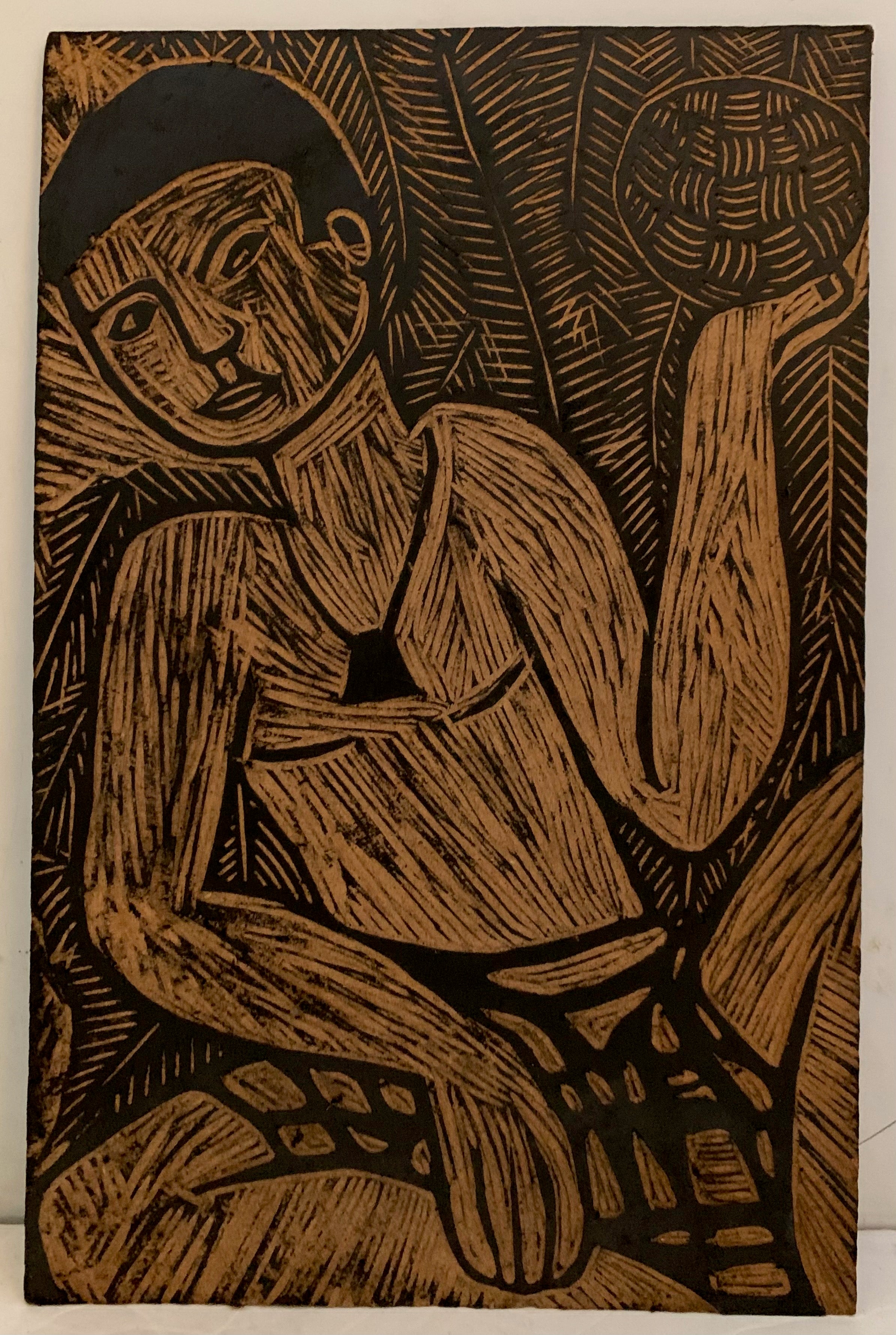 Woodblock of a man holding a ball