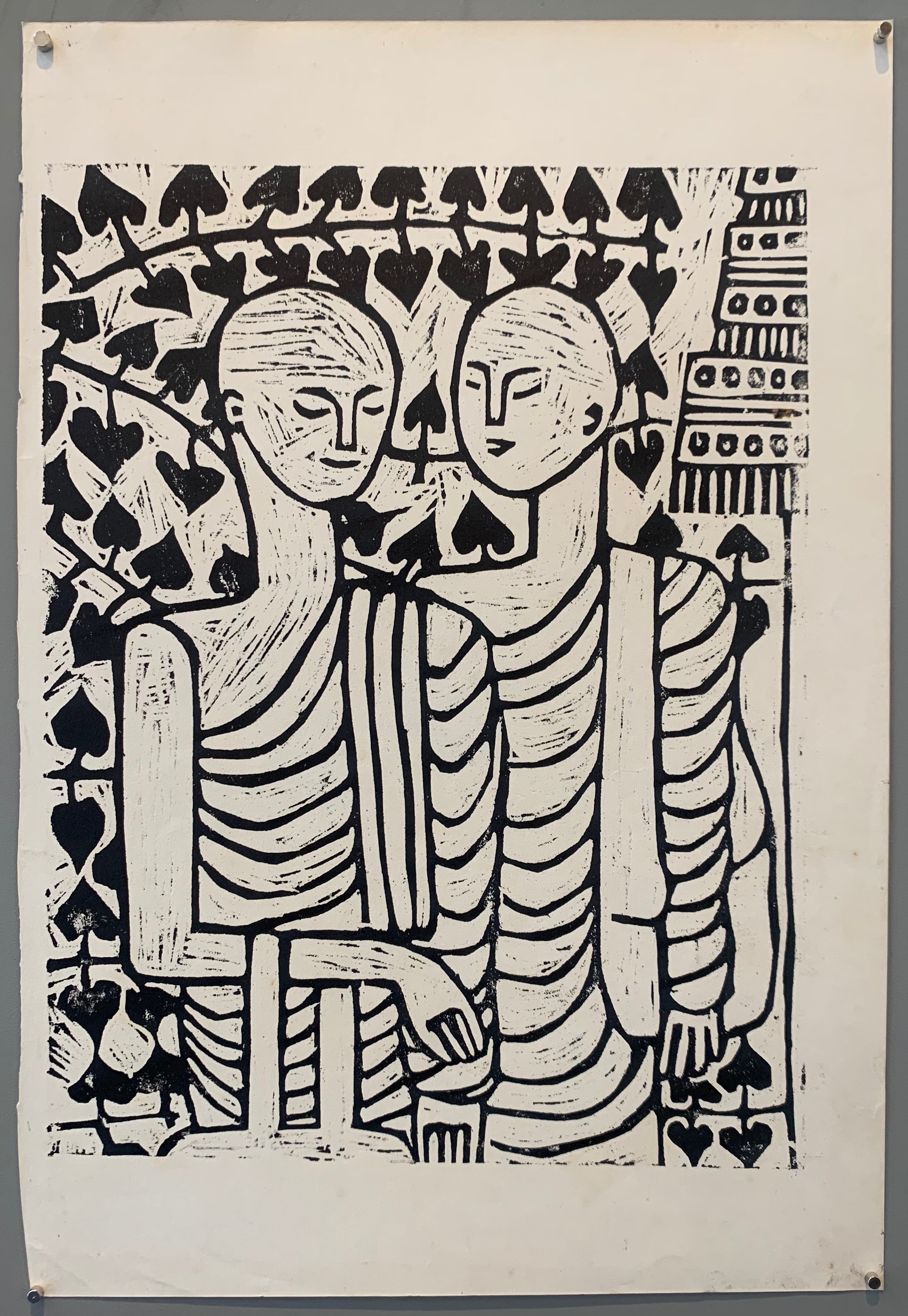black and white woodblock of two monks speaking in a garden