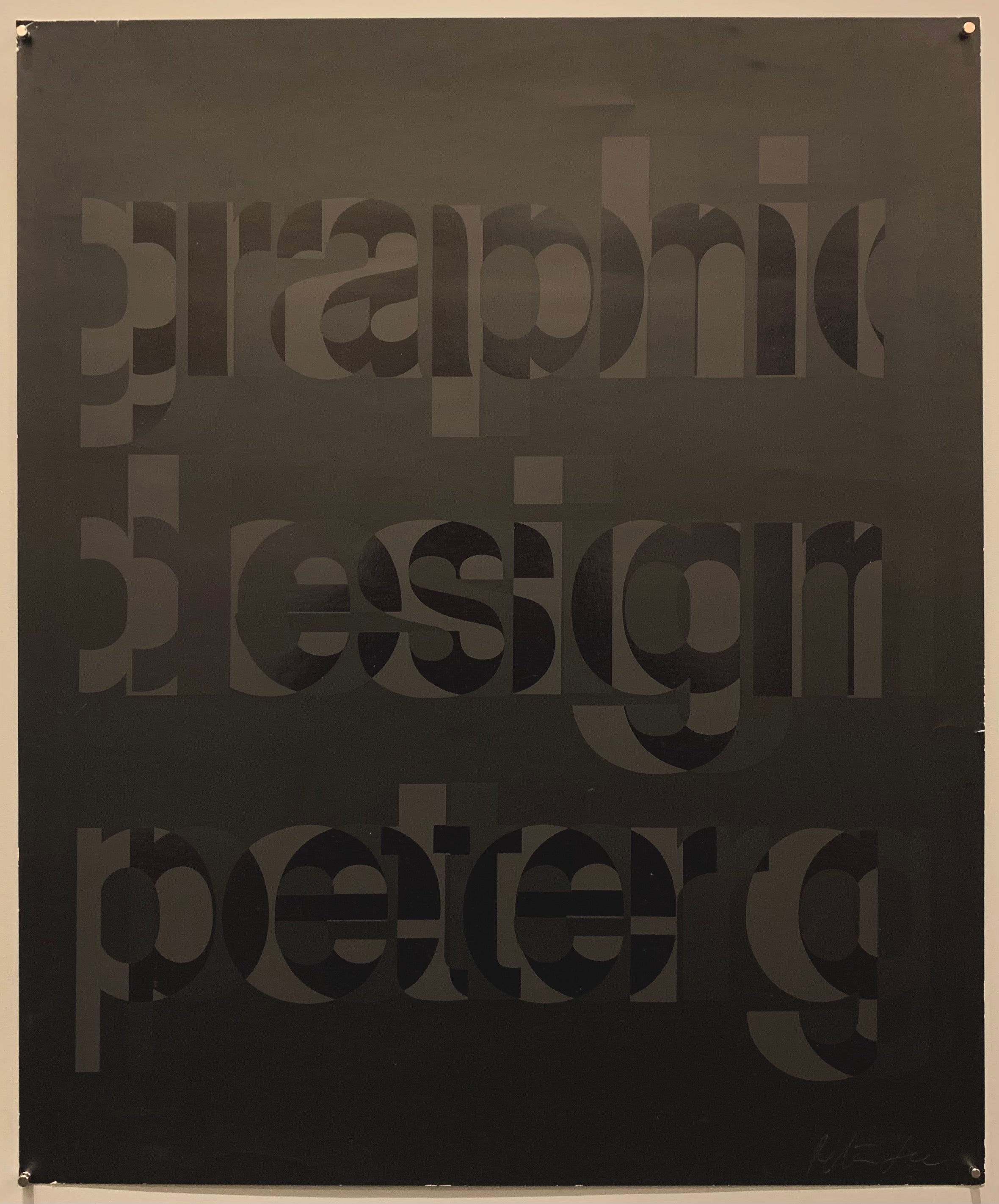 The poster is entirely black. The text takes up the entire print, written in all lowercase, a shiny material that is lighter, and a darker more matte material.