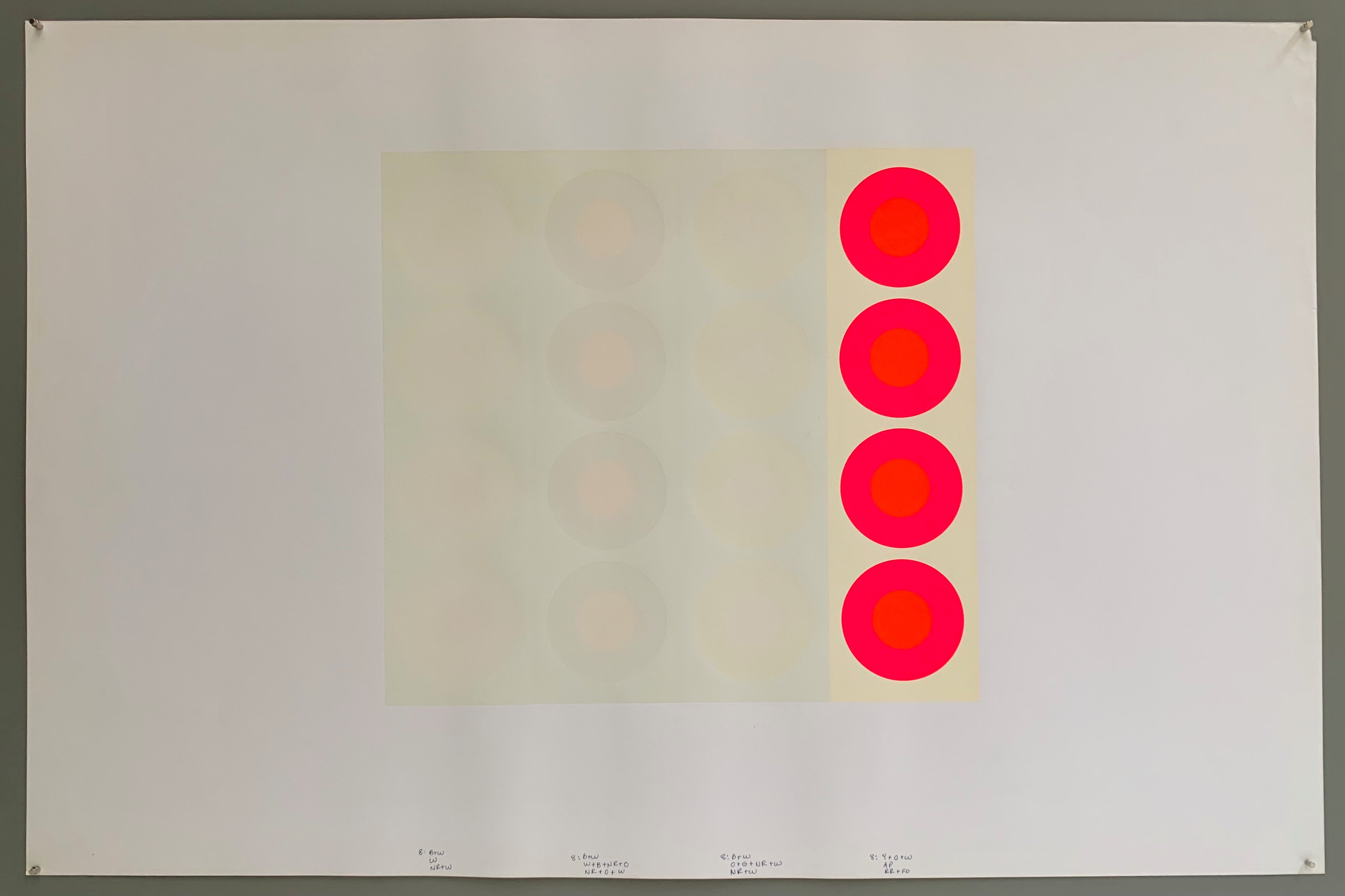 A rectangle made by three panels each holding a line of targets. The colors of this are quite brilliant— creamy whites and grays paired with a pop of neon pink and neon orange.