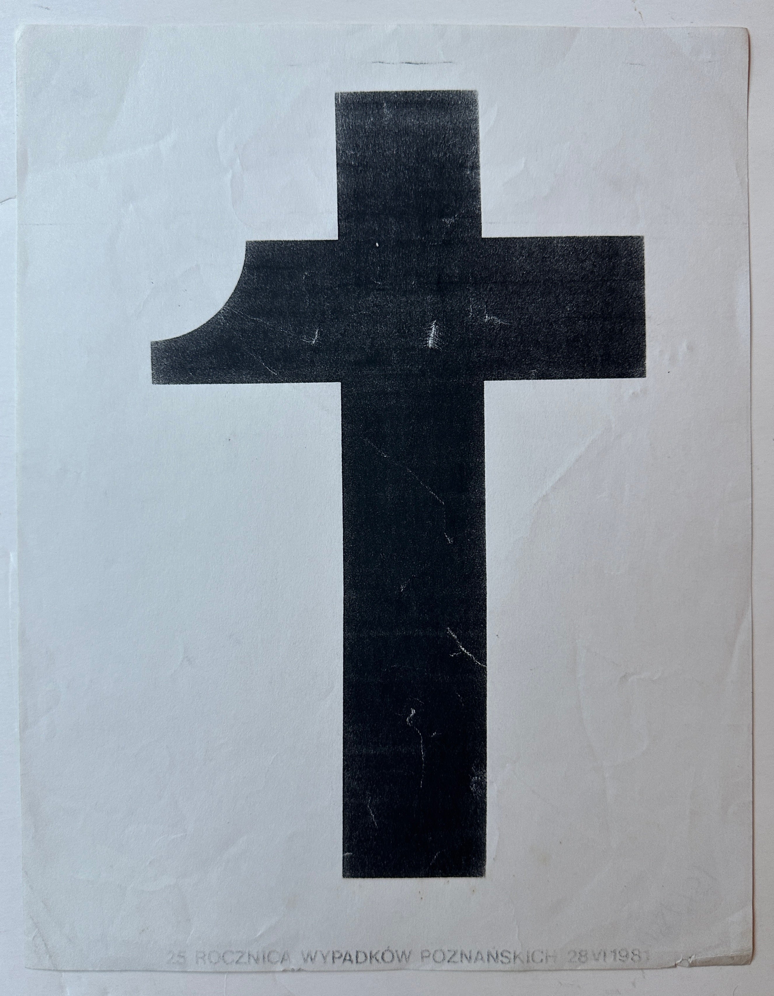 11x9 1981 black and white poster commemmorating 25th anniversary of the polish poznań protests featuring large black cross/obelus