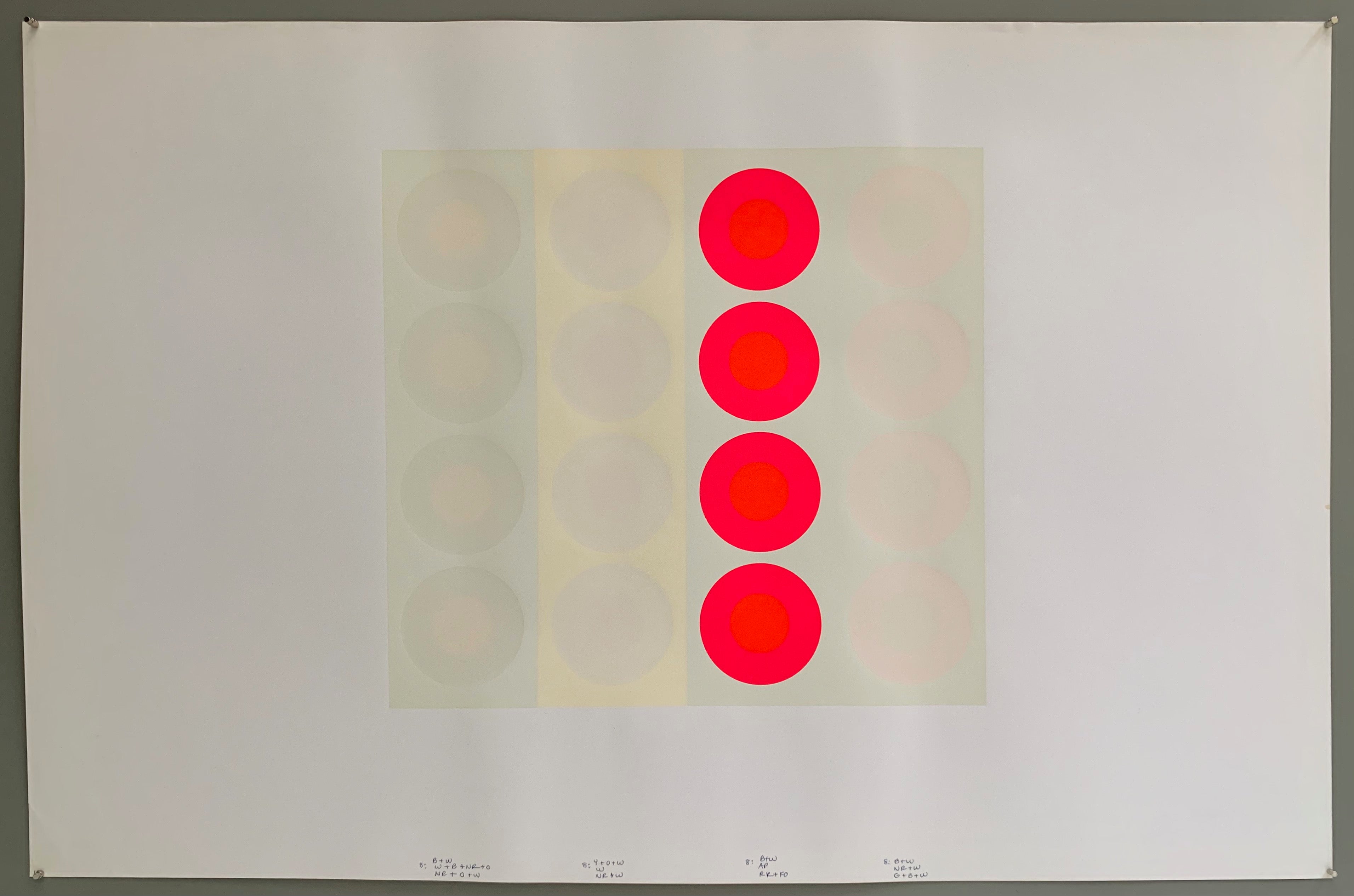 A rectangle made by three panels each holding a line of targets. The colors of this are quite brilliant— creamy whites and grays paired with a pop of neon pink and neon orange.