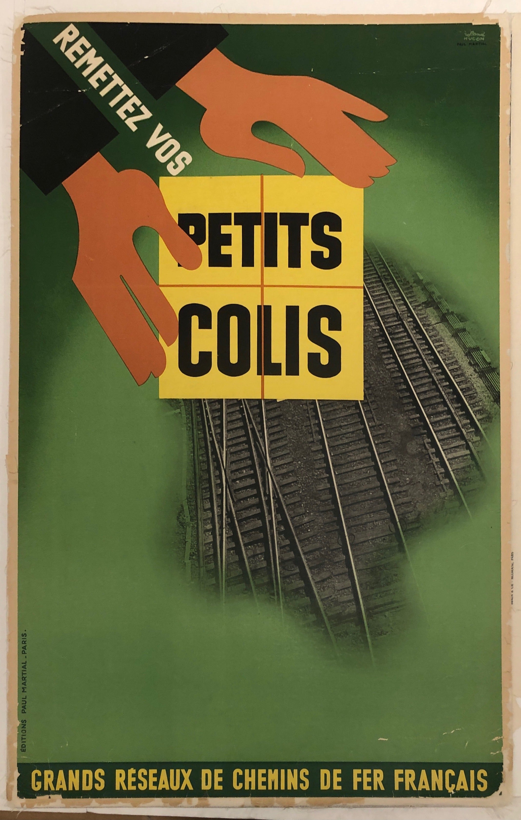 A green, yellow, and black poster is in bold font. A film photo of railway is covered up by the green and yellow.
