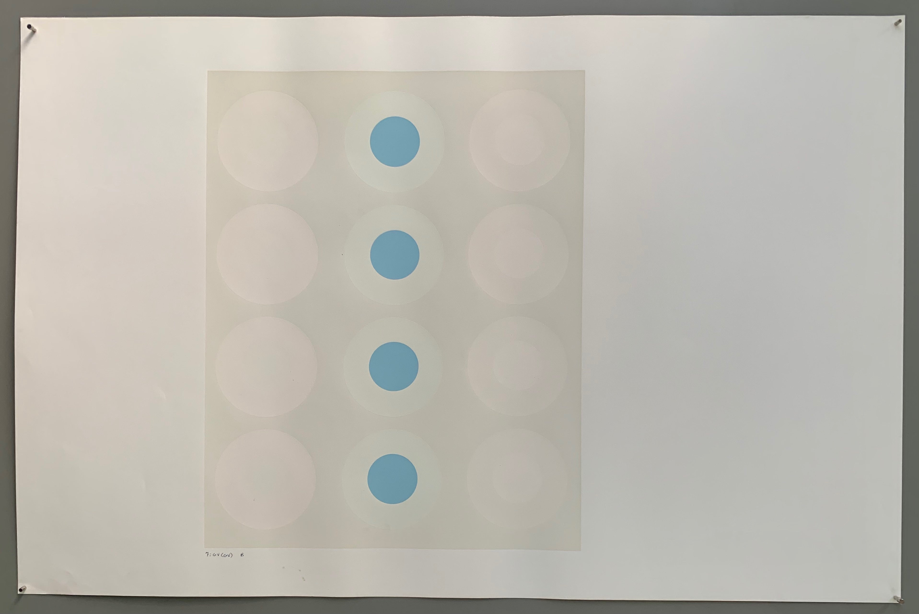 A rectangle made by three panels each holding a line of targets. The colors of this are quite nautical—light grey, white, cream, and a baby blue.