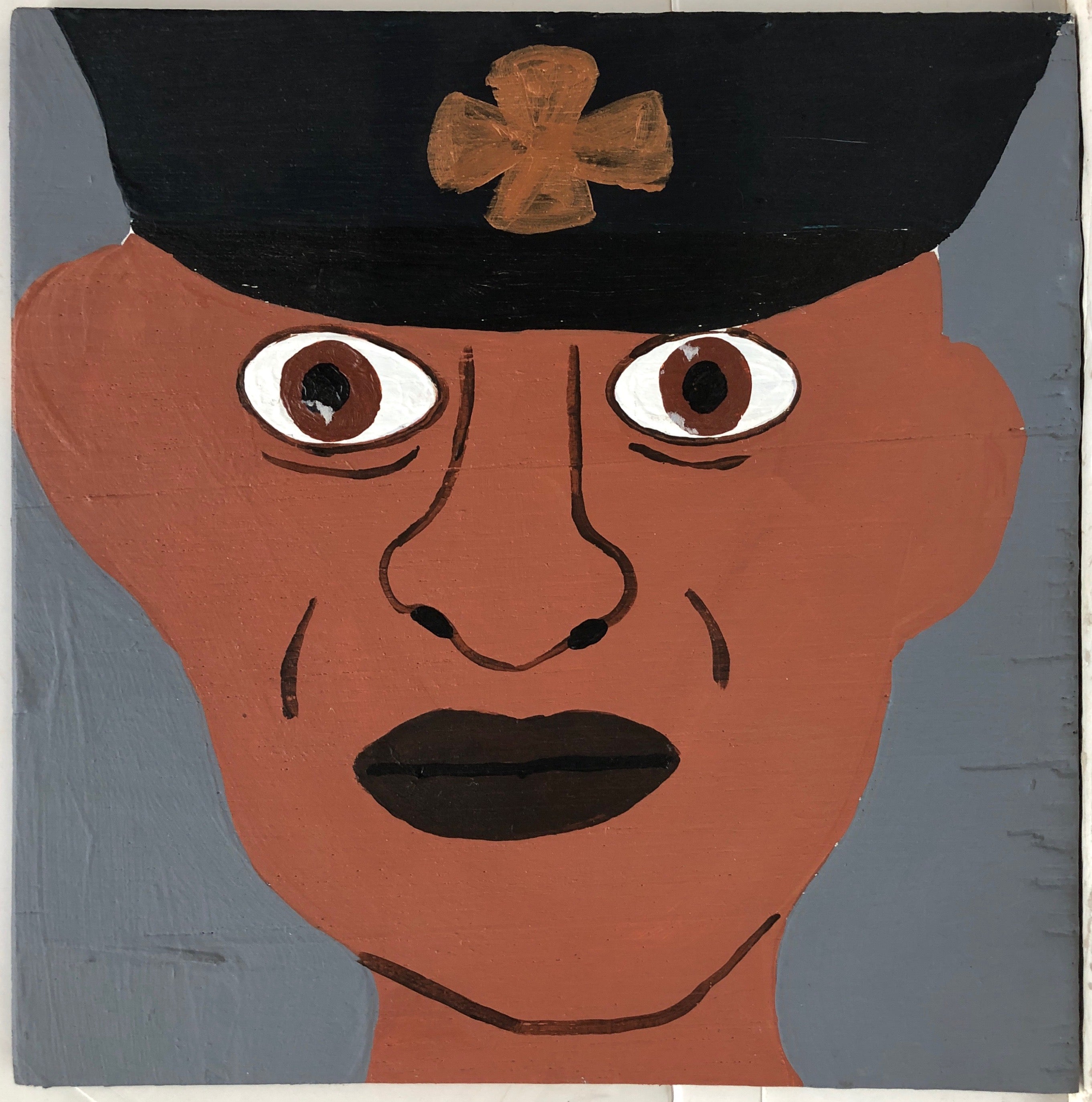 Portrait of Gerard Baptiste in a black firefighter's hat.