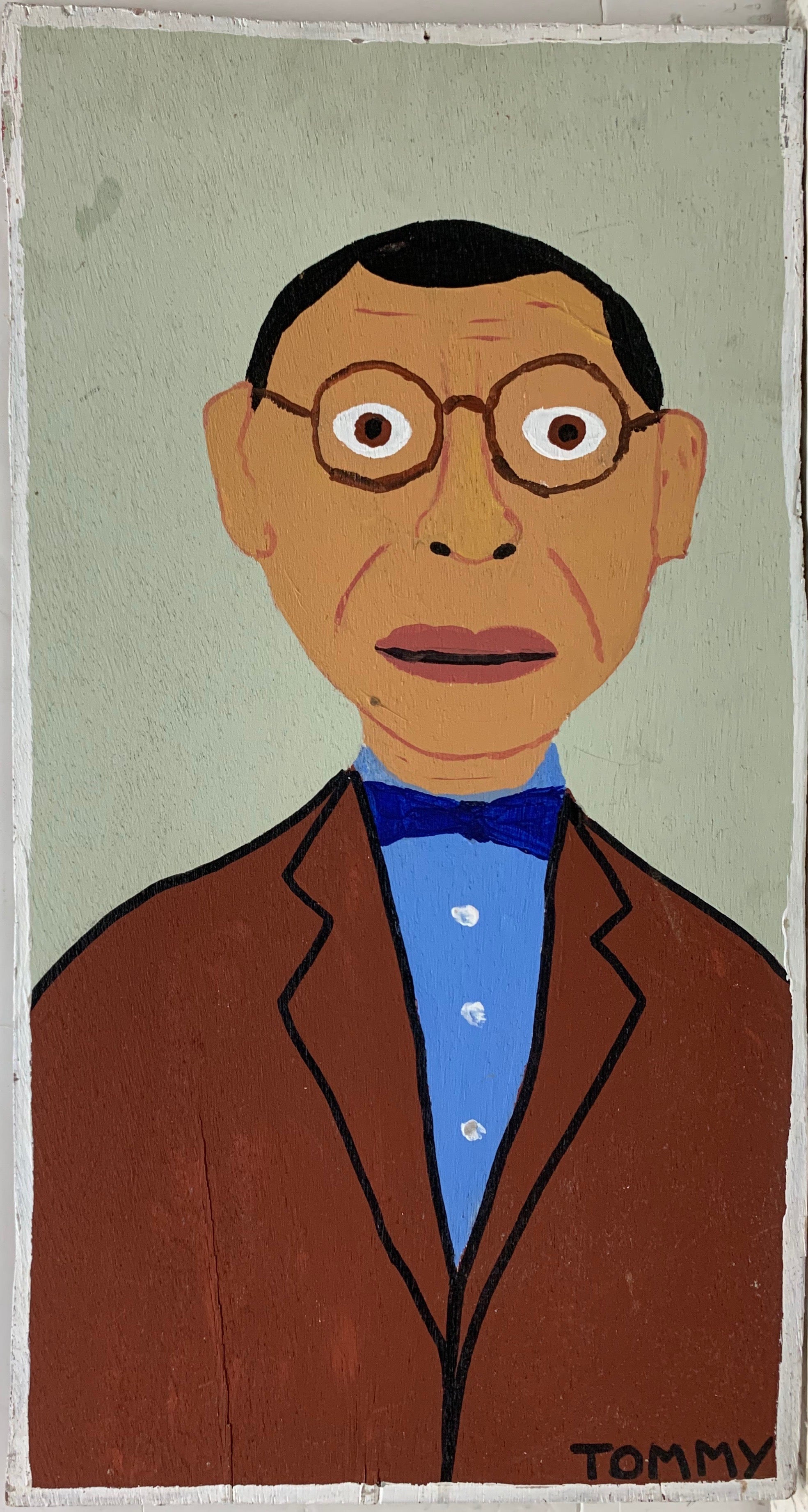 A Tommy Cheng portrait of a man with round glasses, a brown suit jacket, and a blue bow tie.
