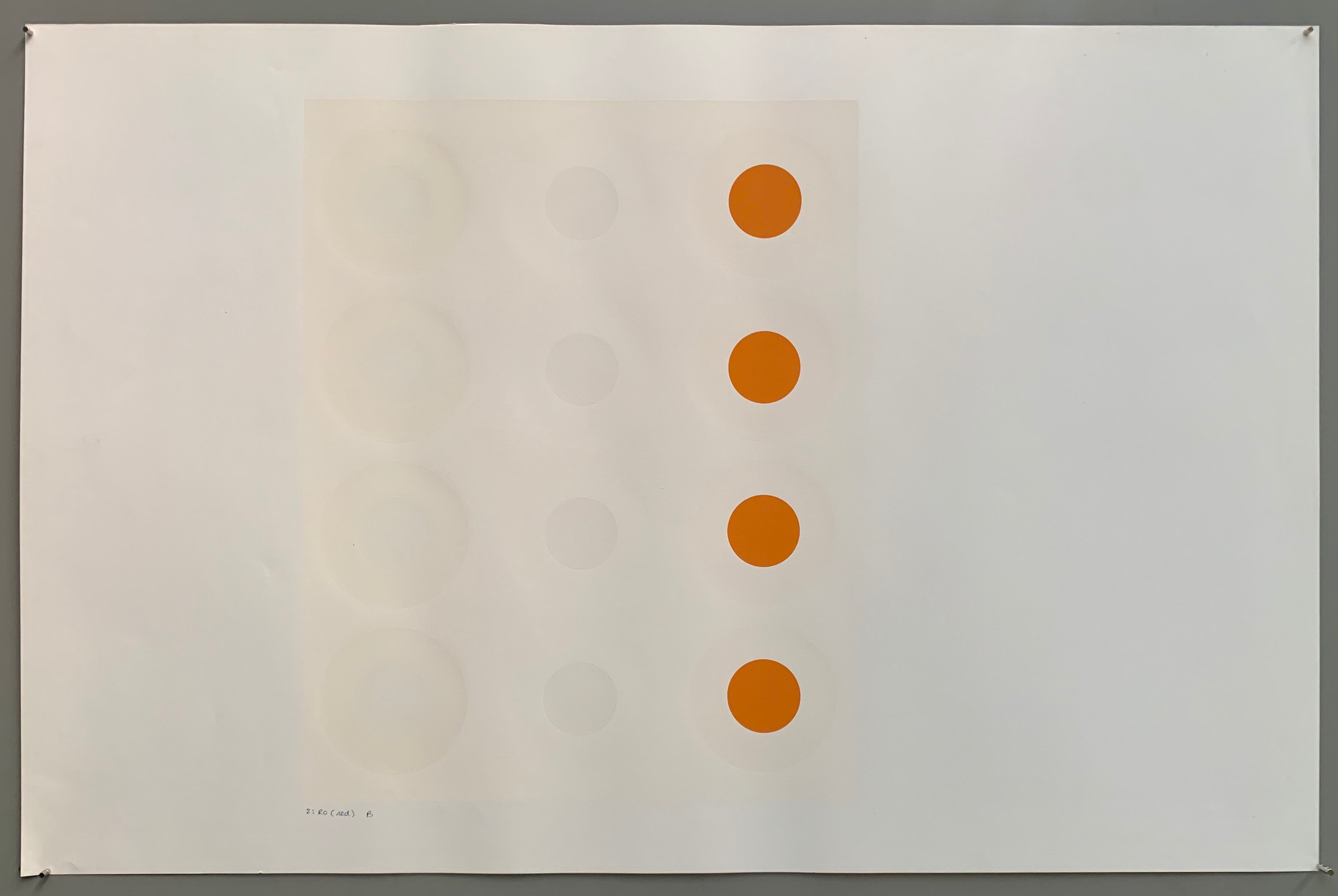 A rectangle made by three panels each holding a line of targets. The colors of this are quite lovely—burnt ochres, whites, light greys, and creams.