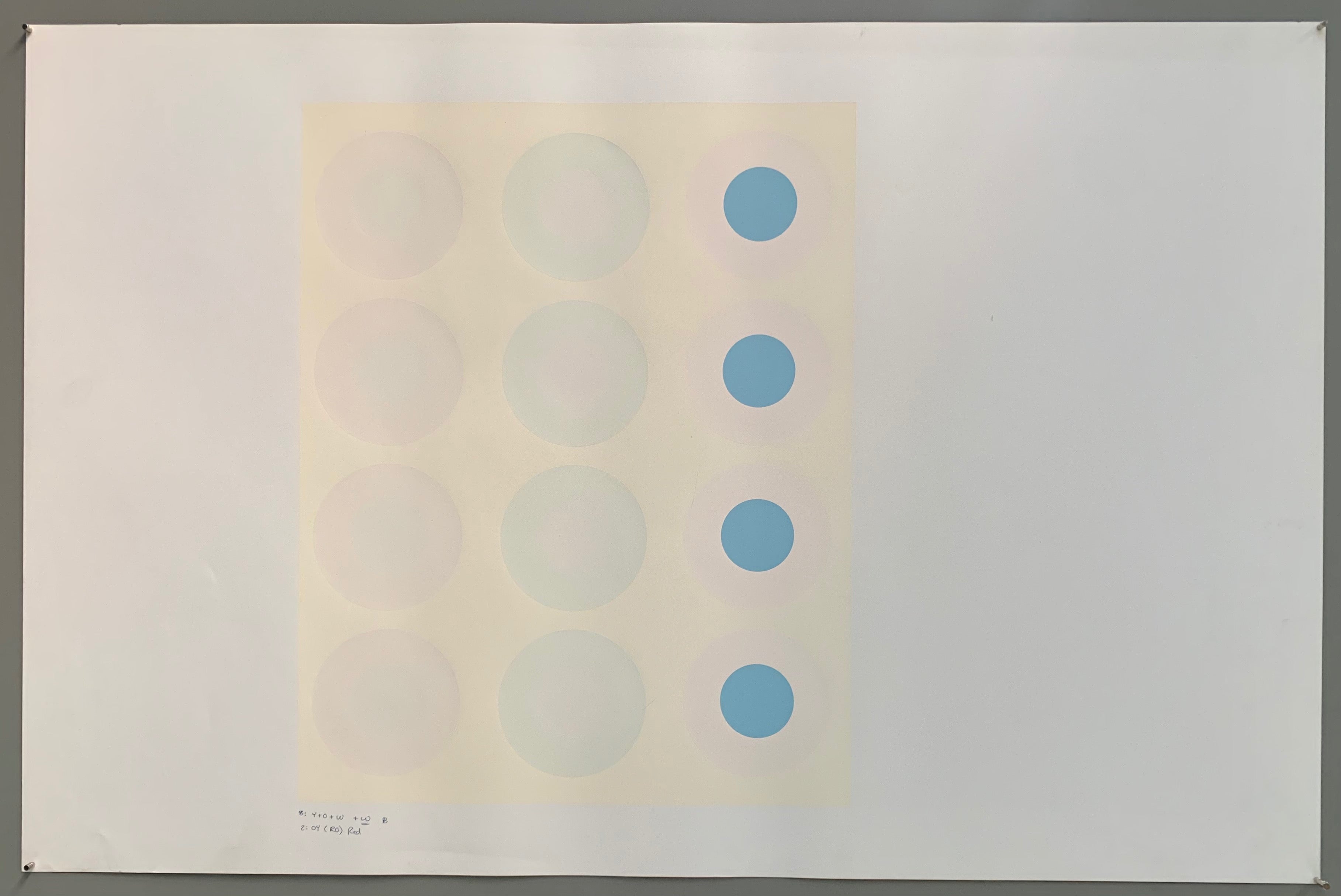 A rectangle made by three panels each holding a line of targets. The colors of this are quite nautical—light grey, white, cream, and a baby blue.