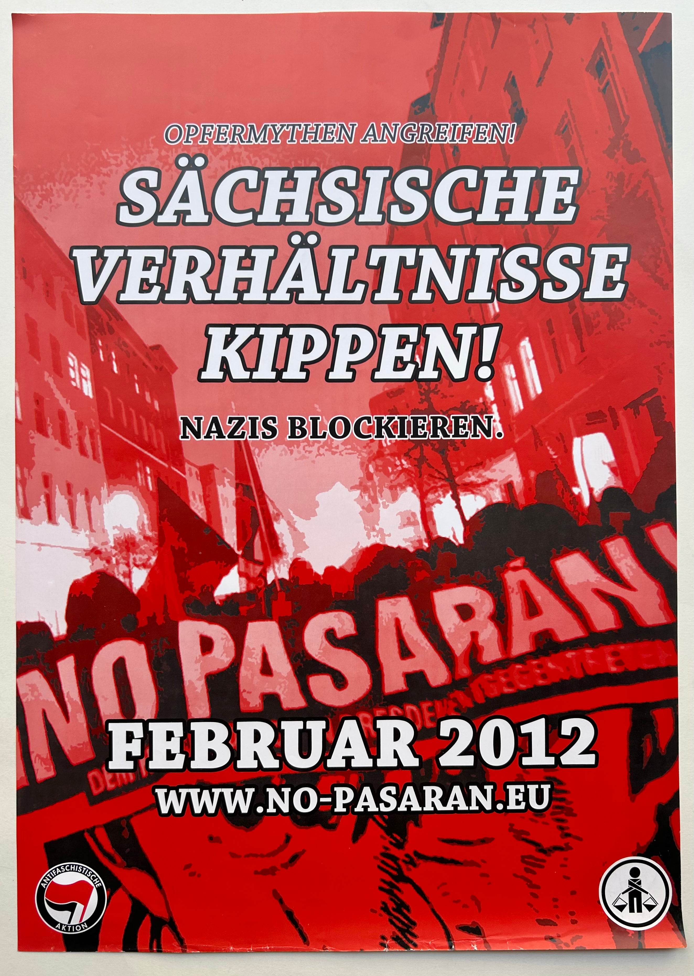 Red image showing a protest, bold white text outlined in black.