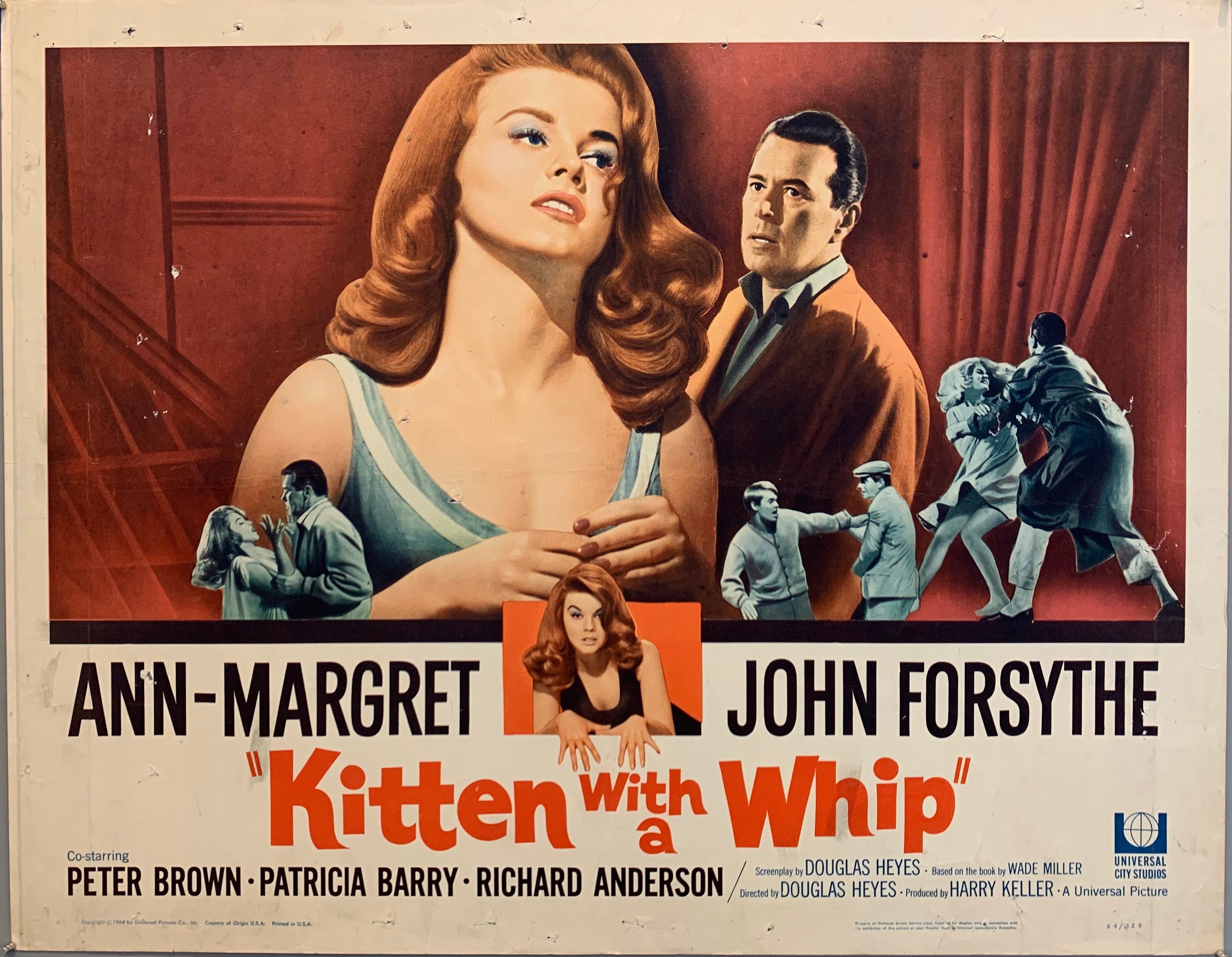 2 people standing and fighting in theater, kitten with a whip movie poster