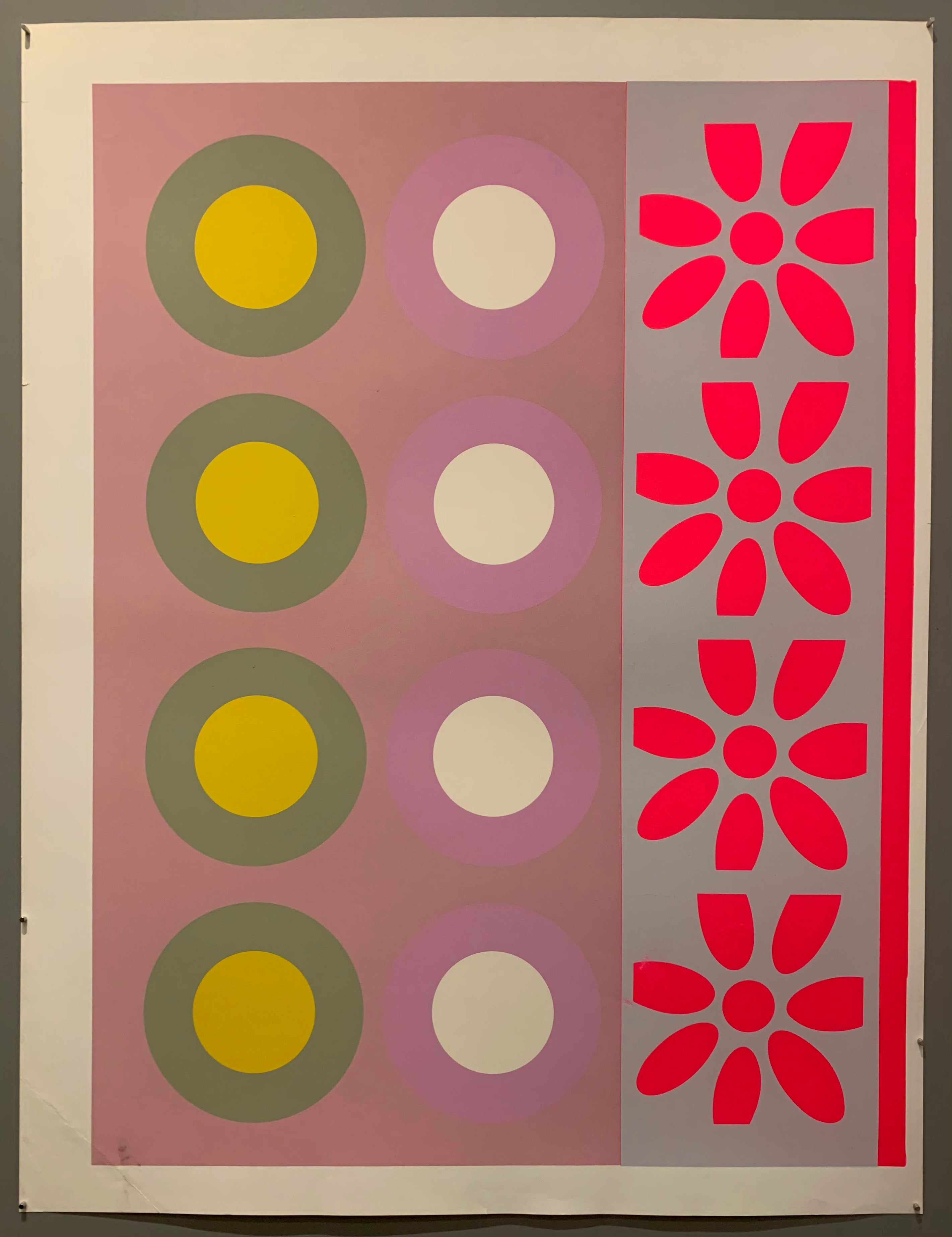 Two rows of targets and one row of flowers.