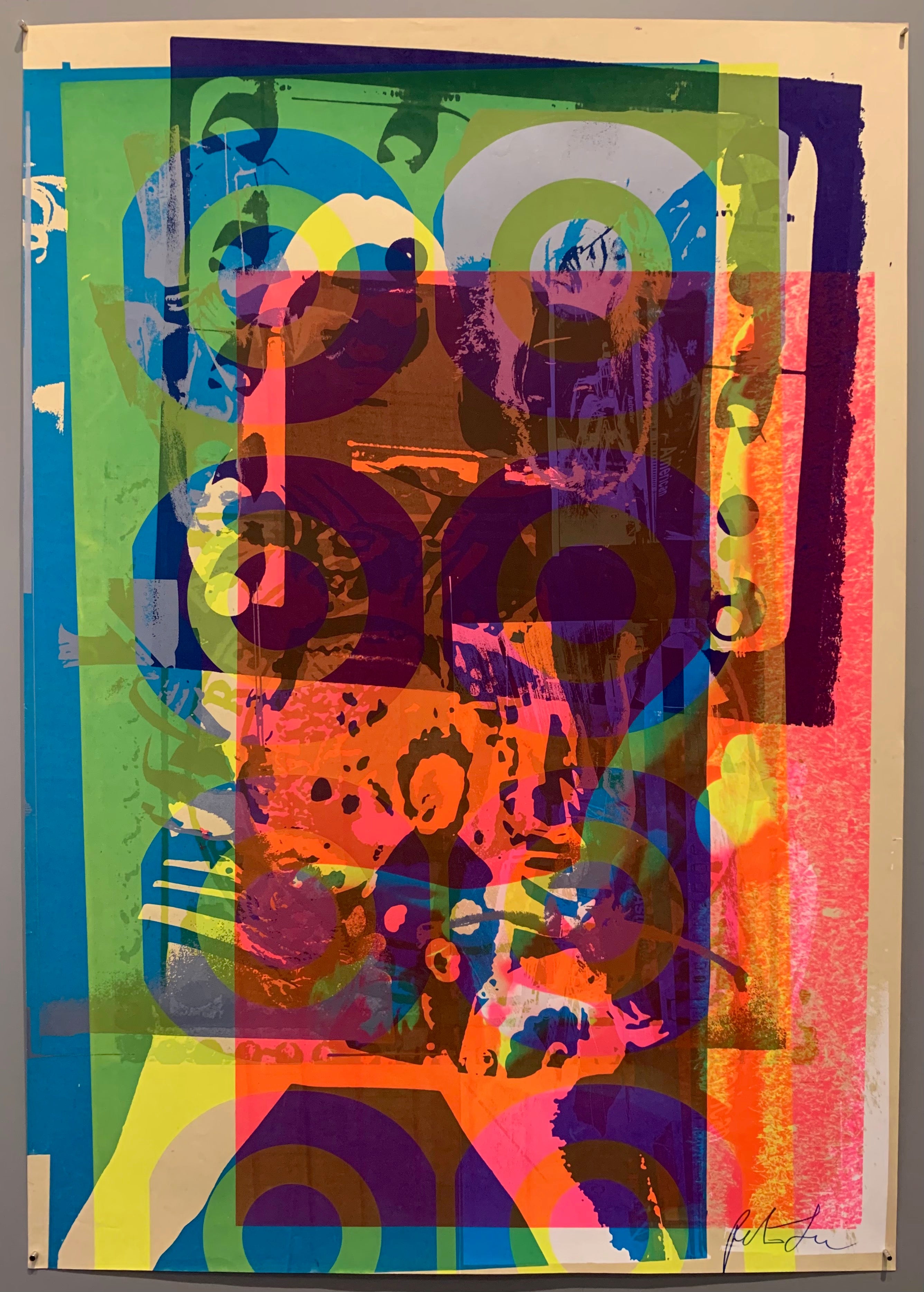 A mix of pop art-style images lay over each other in many neon colors.