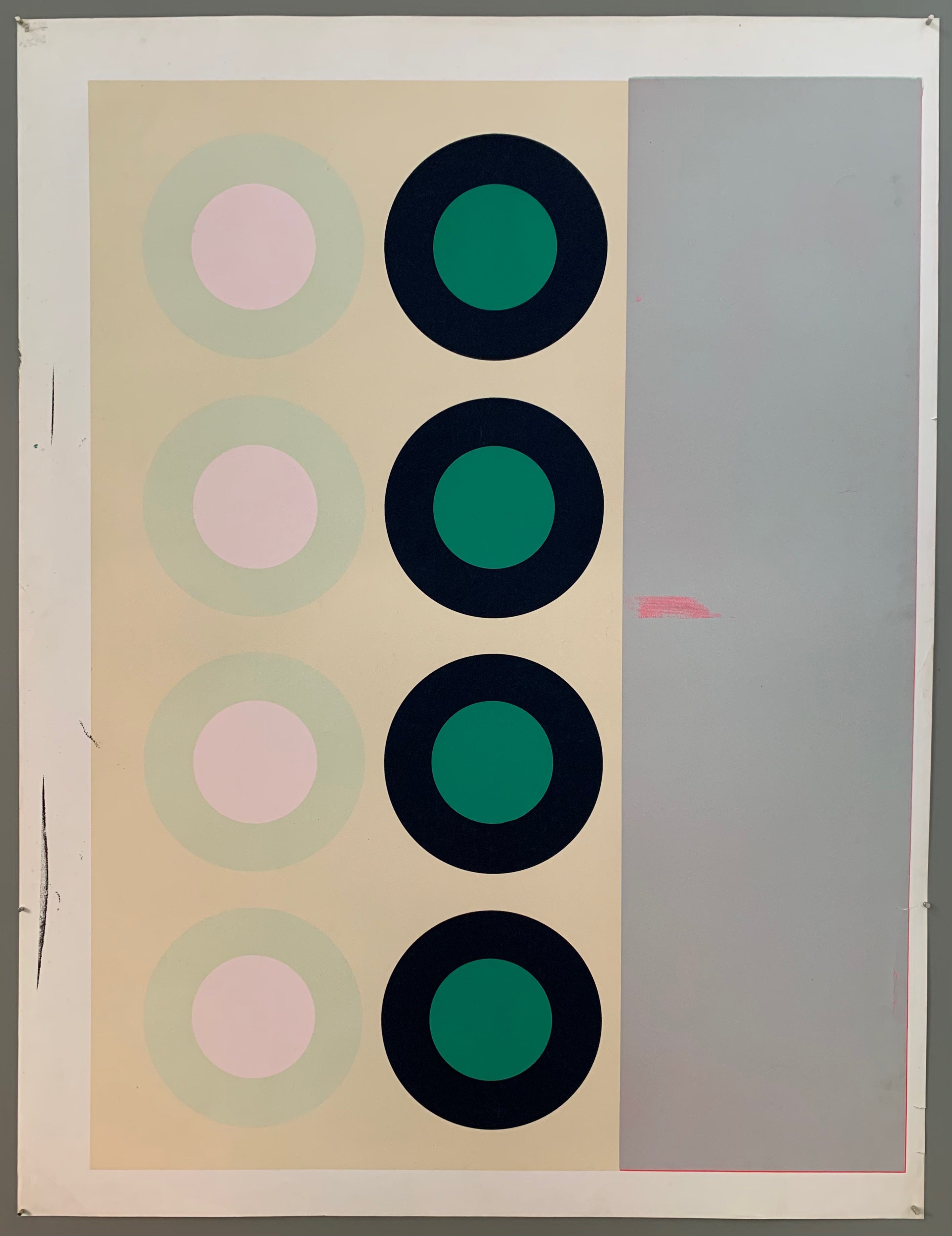 Two panels with rows of circles, eight in total. A metallic grey panel is on the right side. The border is white and is thicker on the left side.