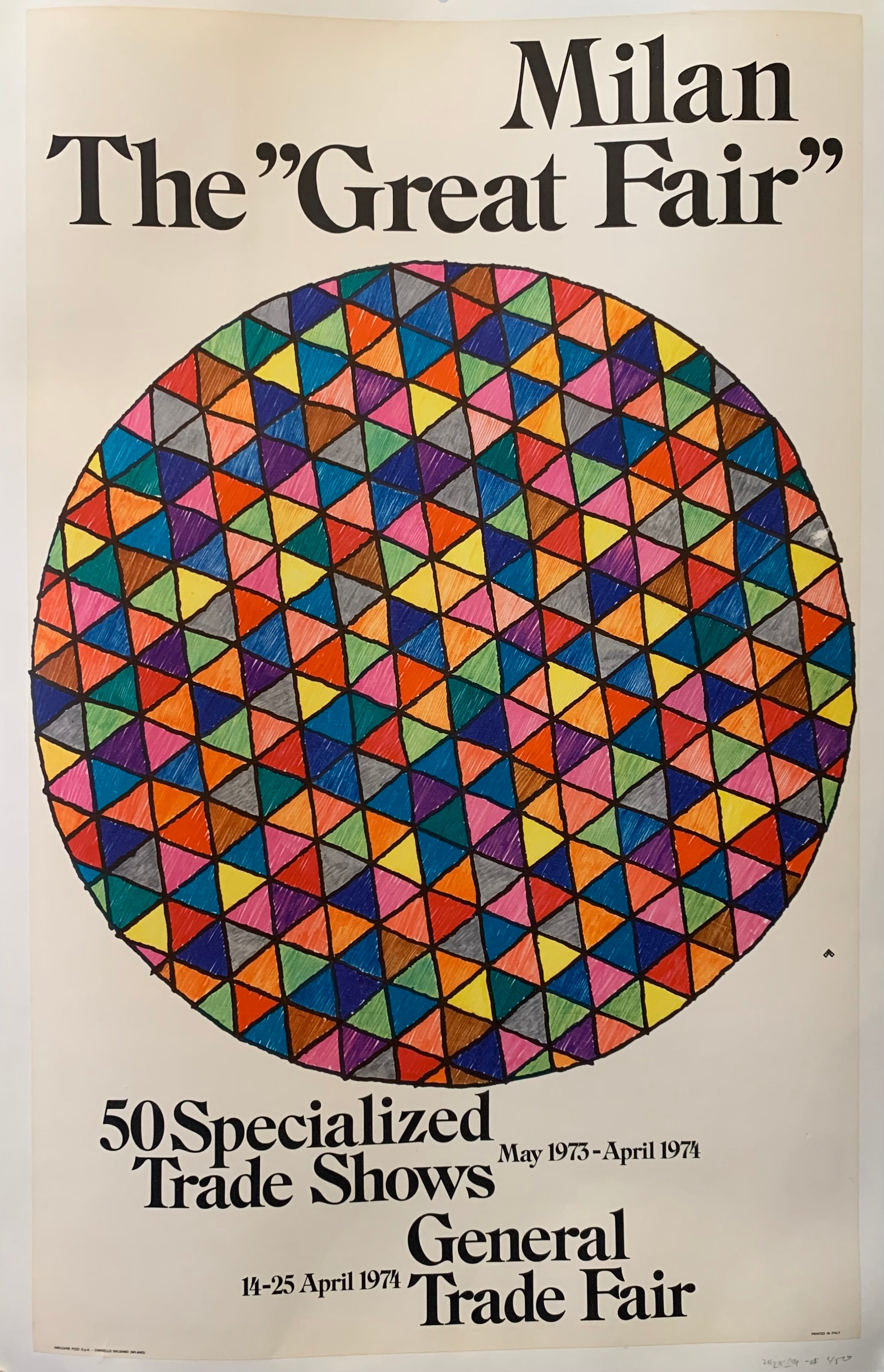 The geometric circle of is colored in with stained-glass like triangles of various colors. The clean black font makes this quite a crisp image.