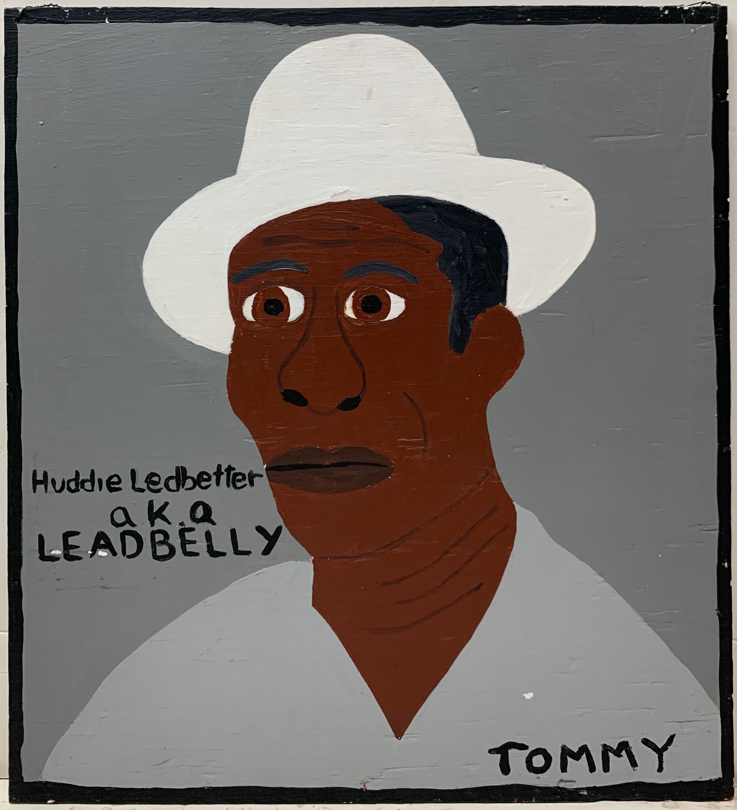Tommy Cheng portrait of Huddie Ledbetter also known as Lead Belly with a white hat on his head and a gray shirt.