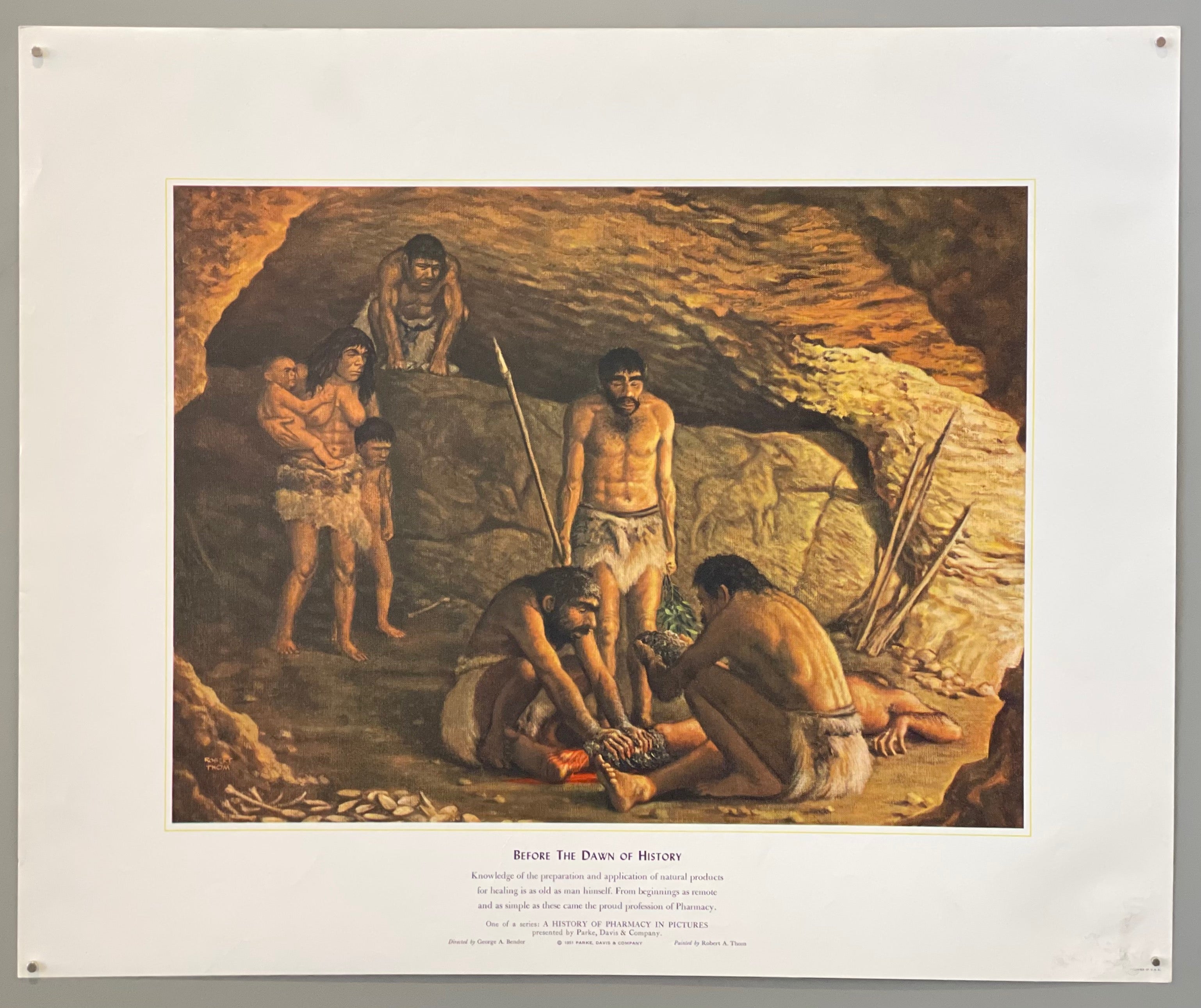 poster of prehistoric men healing an injured man