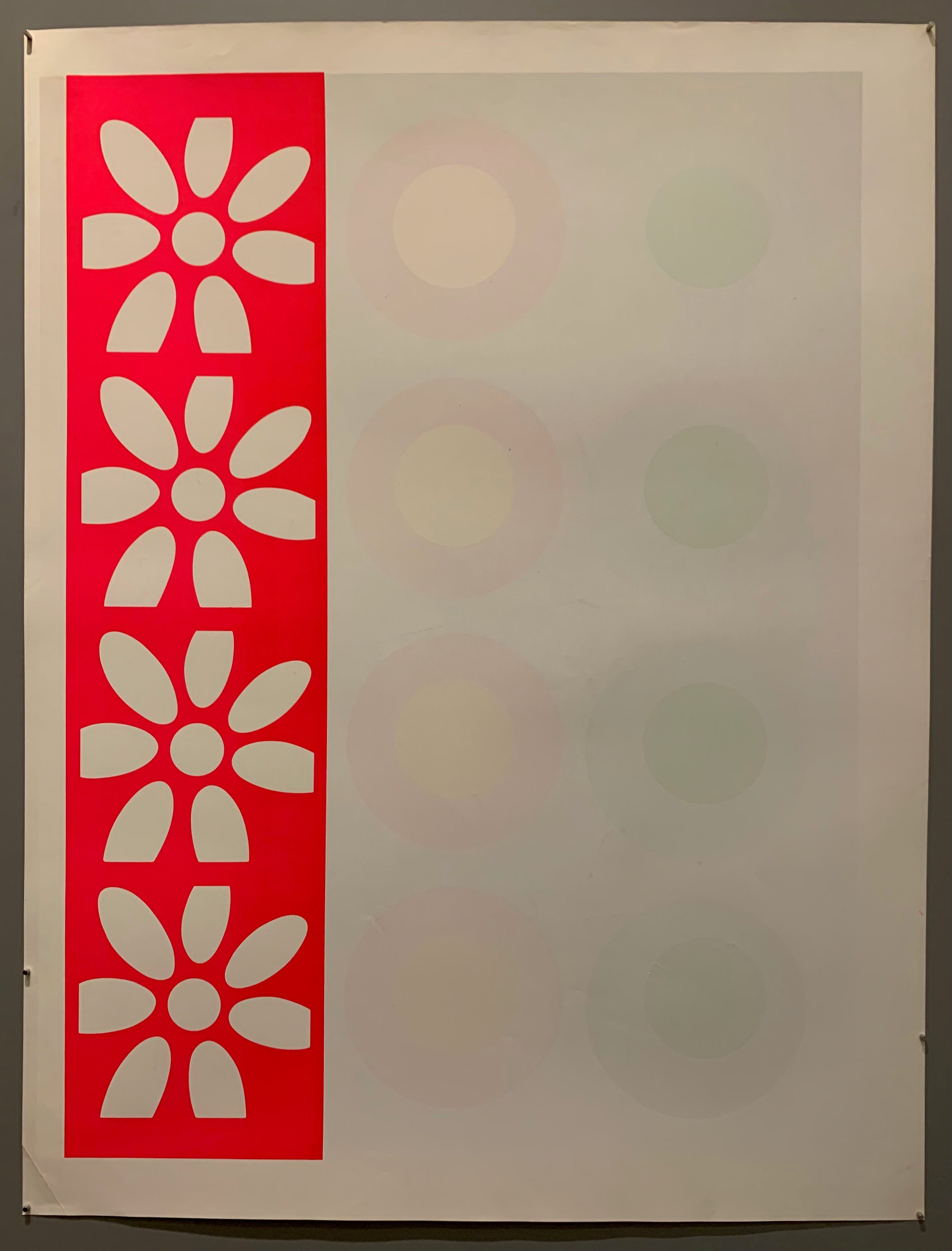 Two rows of targets and one row of flowers.