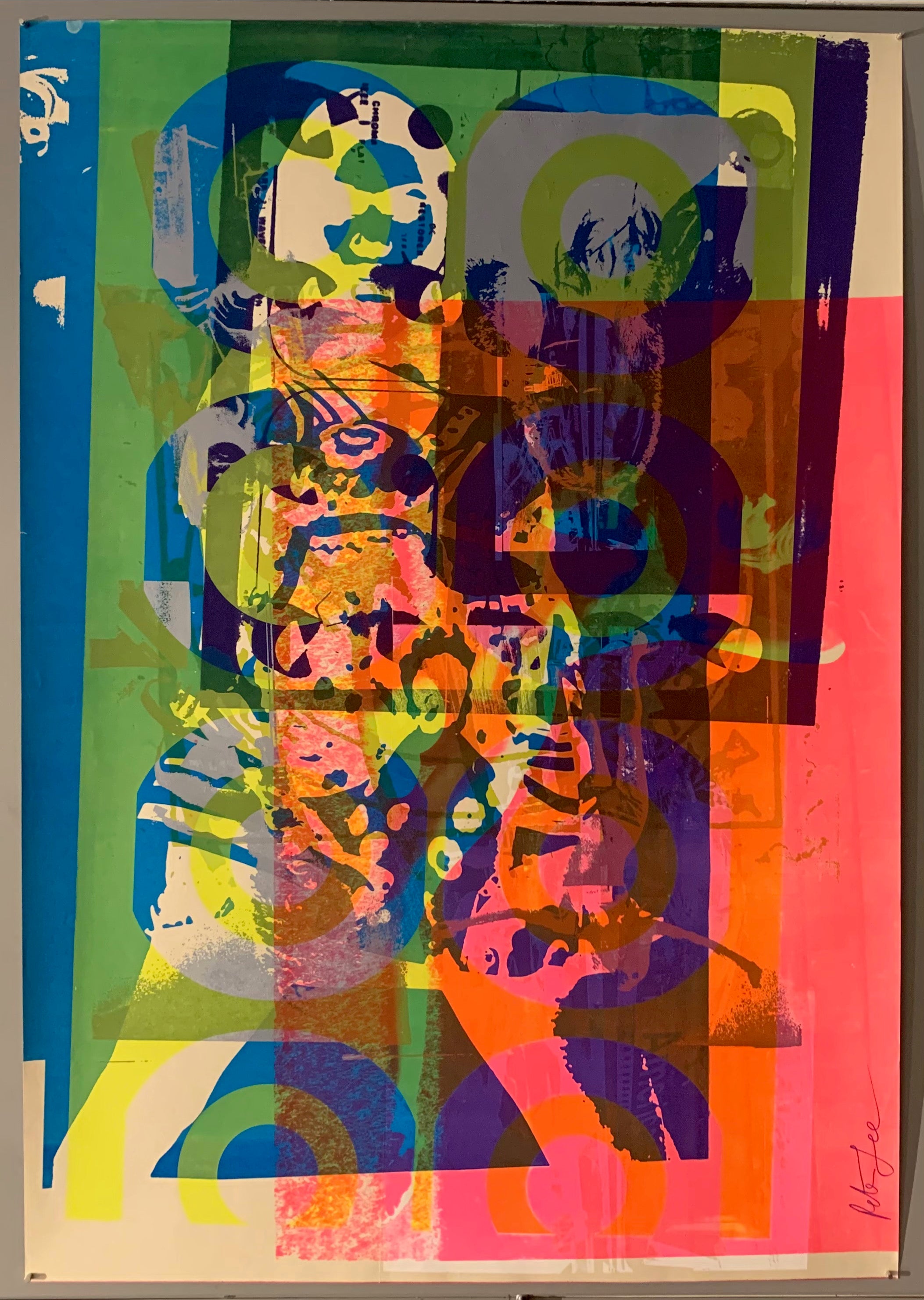 A mix of pop art-style images lay over each other in many neon colors.