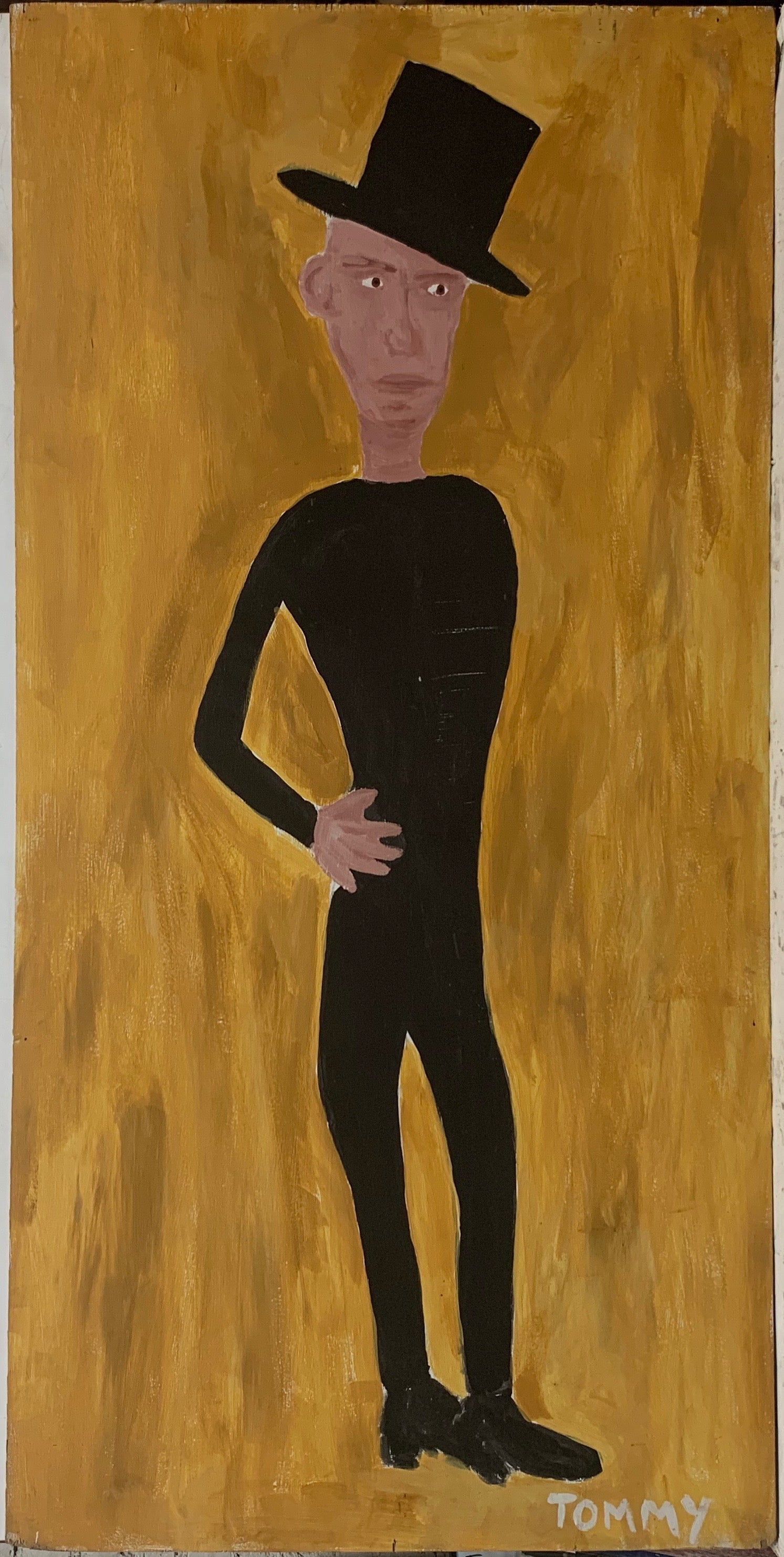 A Tommy Cheng portrait of Percy Pape in a black jumpsuit and black top hat against a golden background.