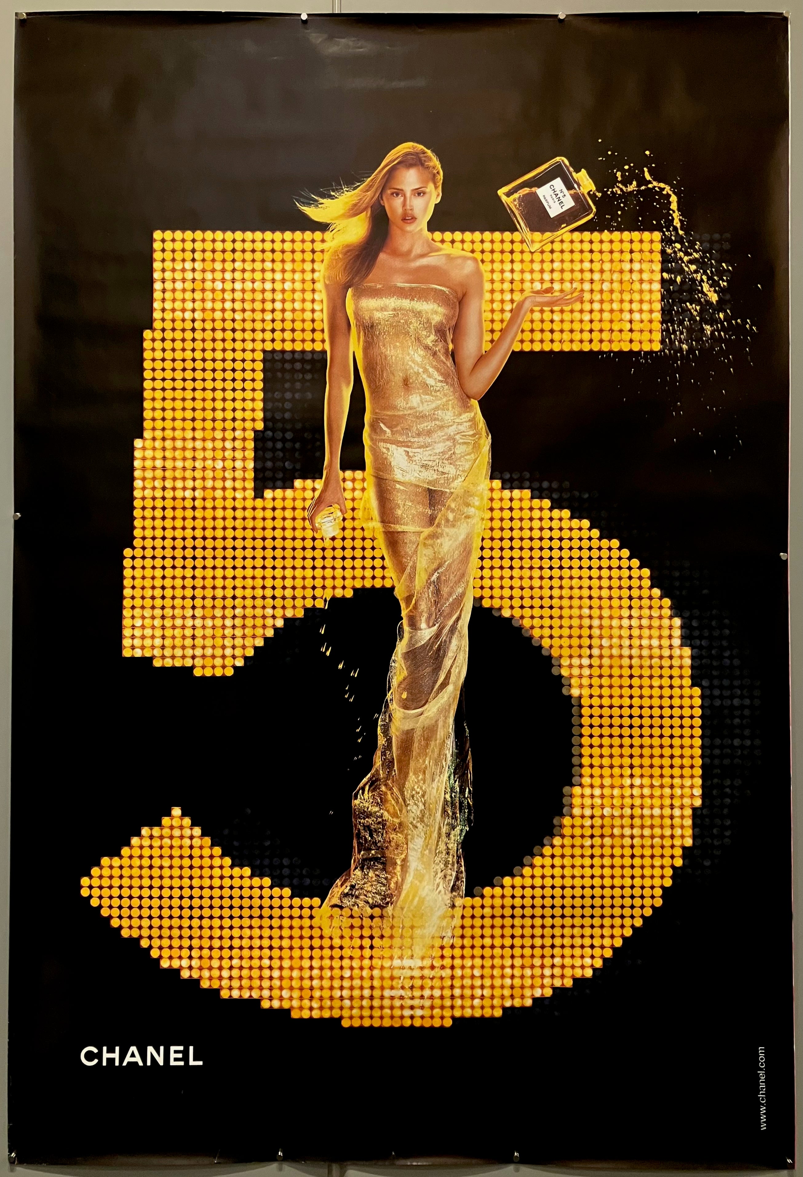 69x47 chanel poster advertising iconic perfume chanel no.5 featuring actress estella warren in gold dress with large bottle of perfume and number 5