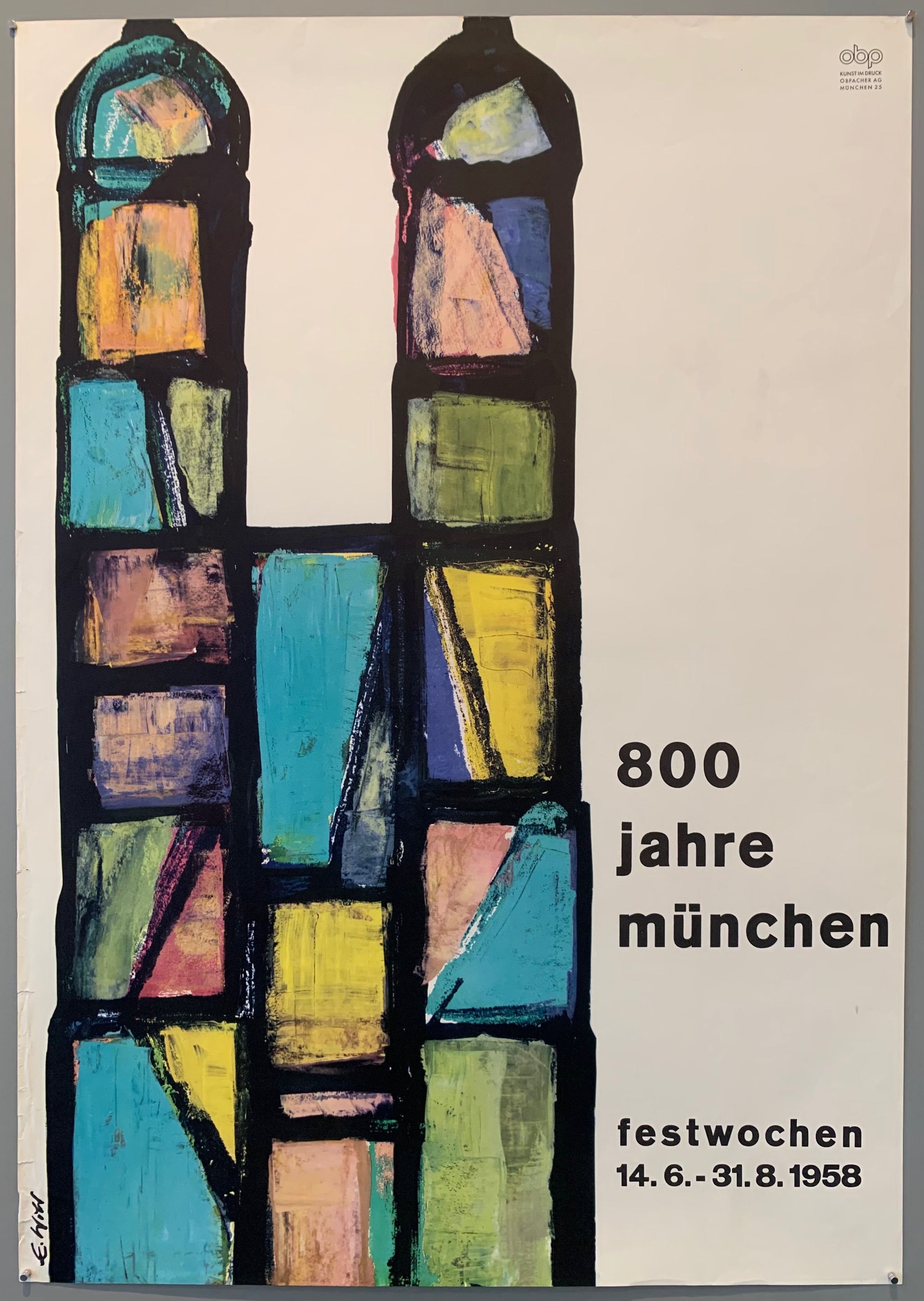 Shows an abstract painting of the Frauenkirche in Munich next to title over a white background.