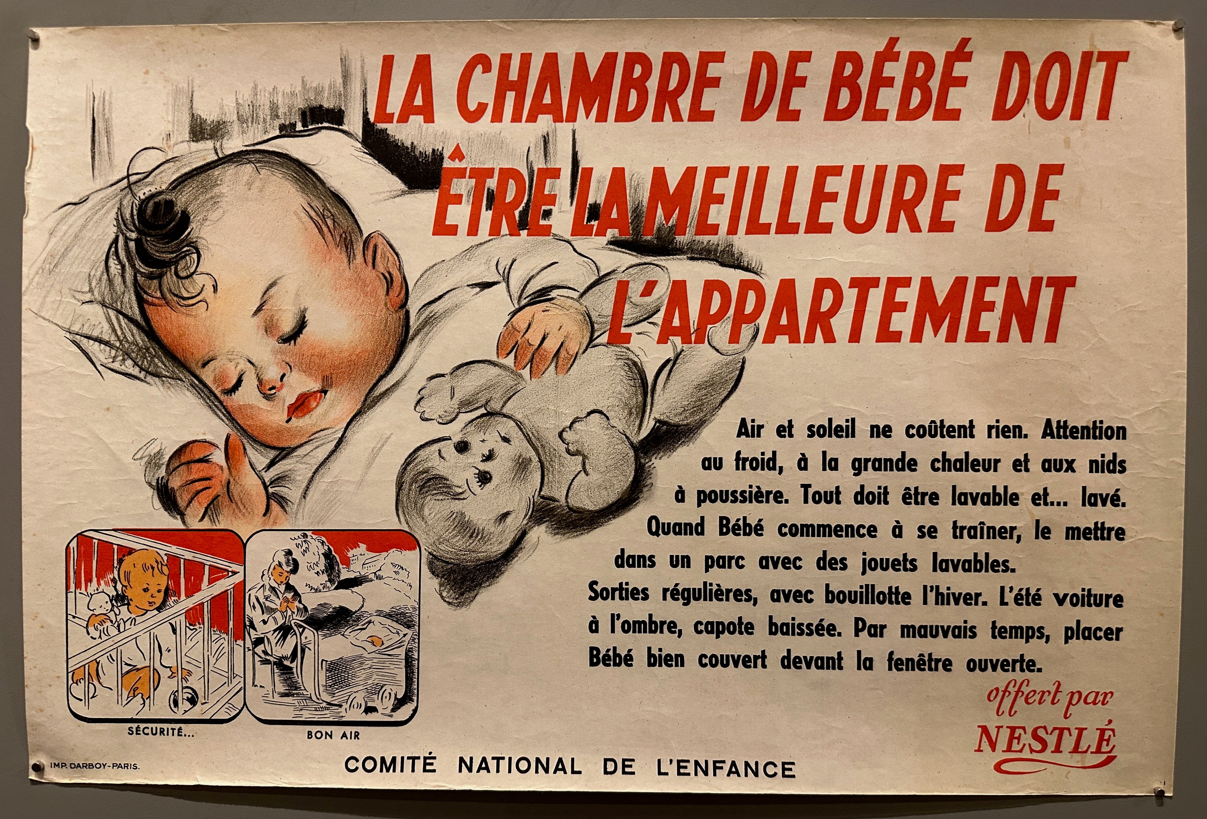 24x16 horizontal poster, illustrated baby sleeping with doll next to red and black text for Nestle
