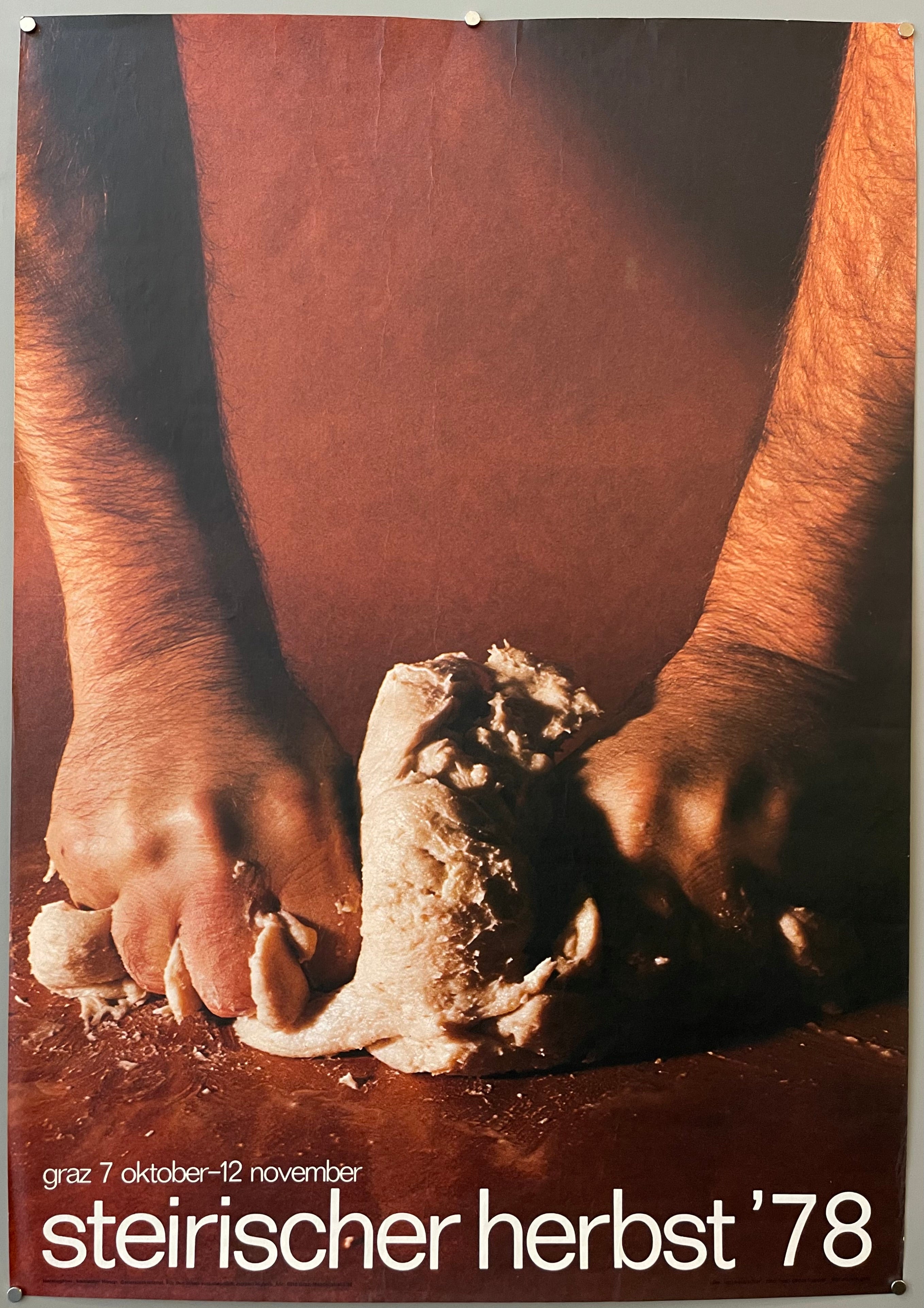 poster of a man kneading dough