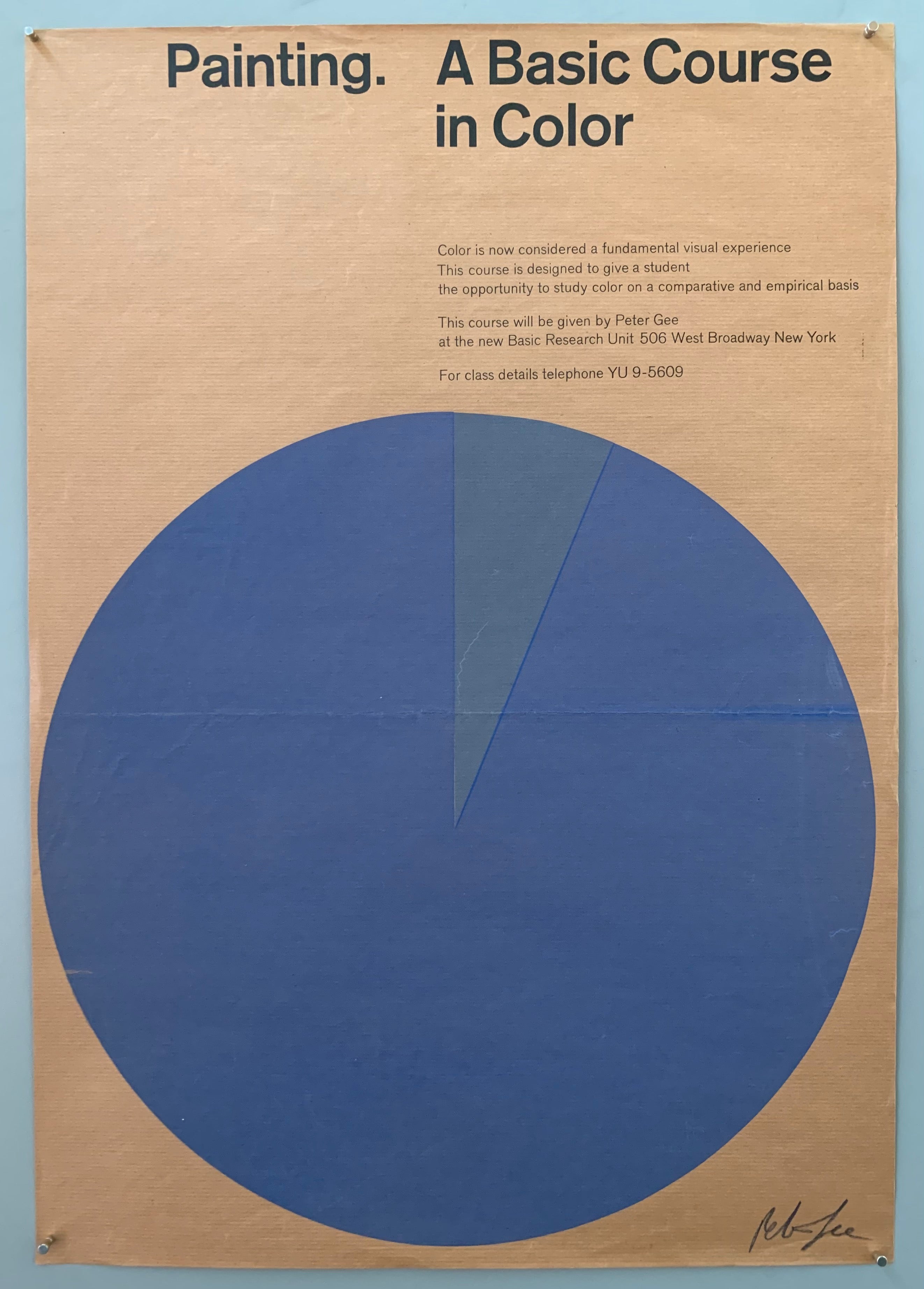 A large circle has a piece cut out of it in a different color. The font is at the top in black. The colors used are blue, blue-grey, and a textured tan paper.