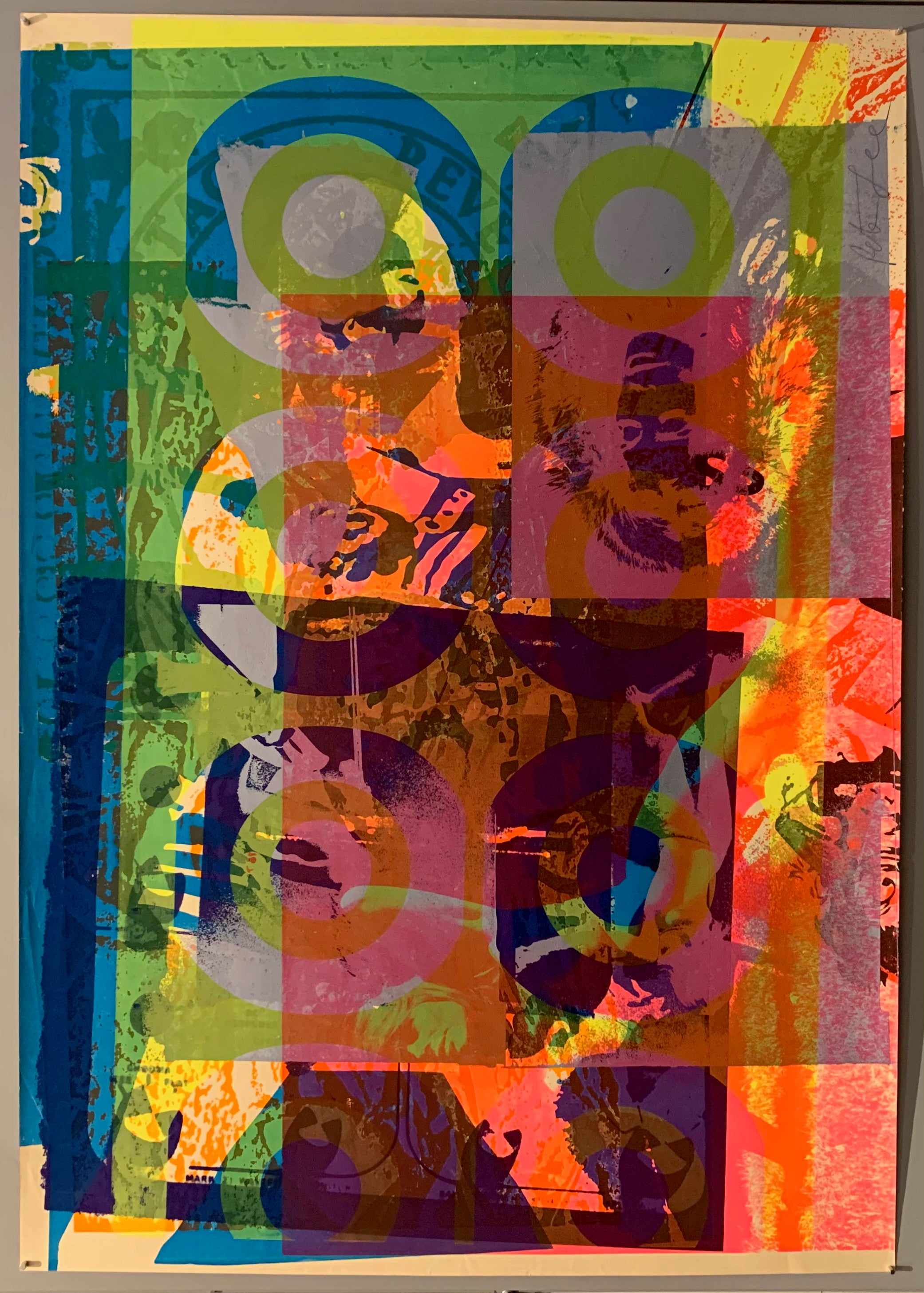 A mix of pop art-style images lay over each other in many neon colors.