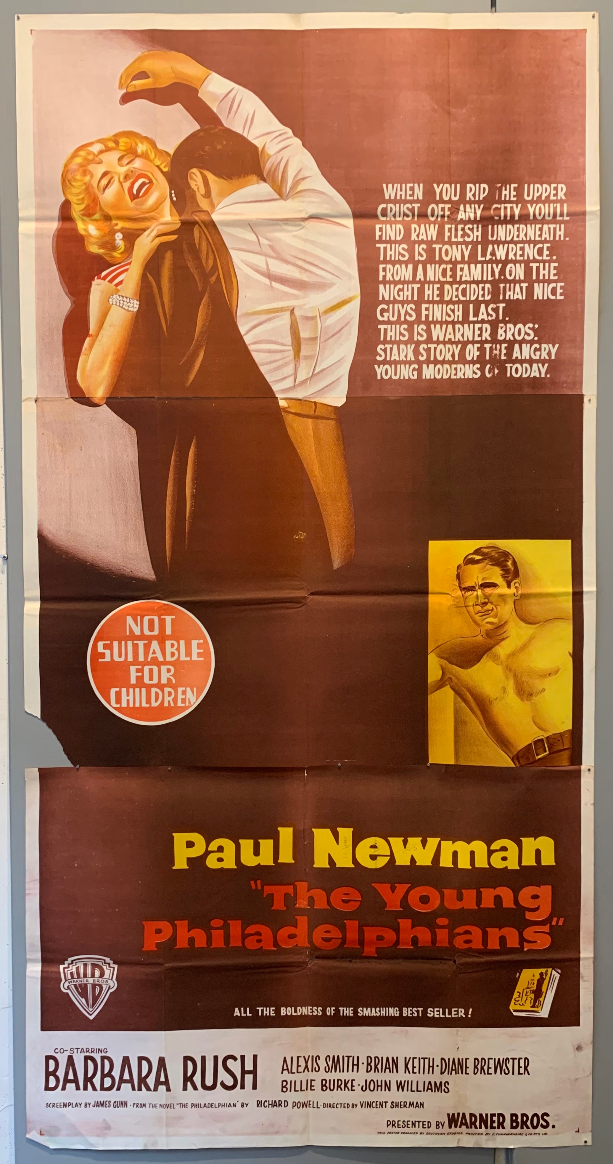 background brown. man and woman hugging against wall