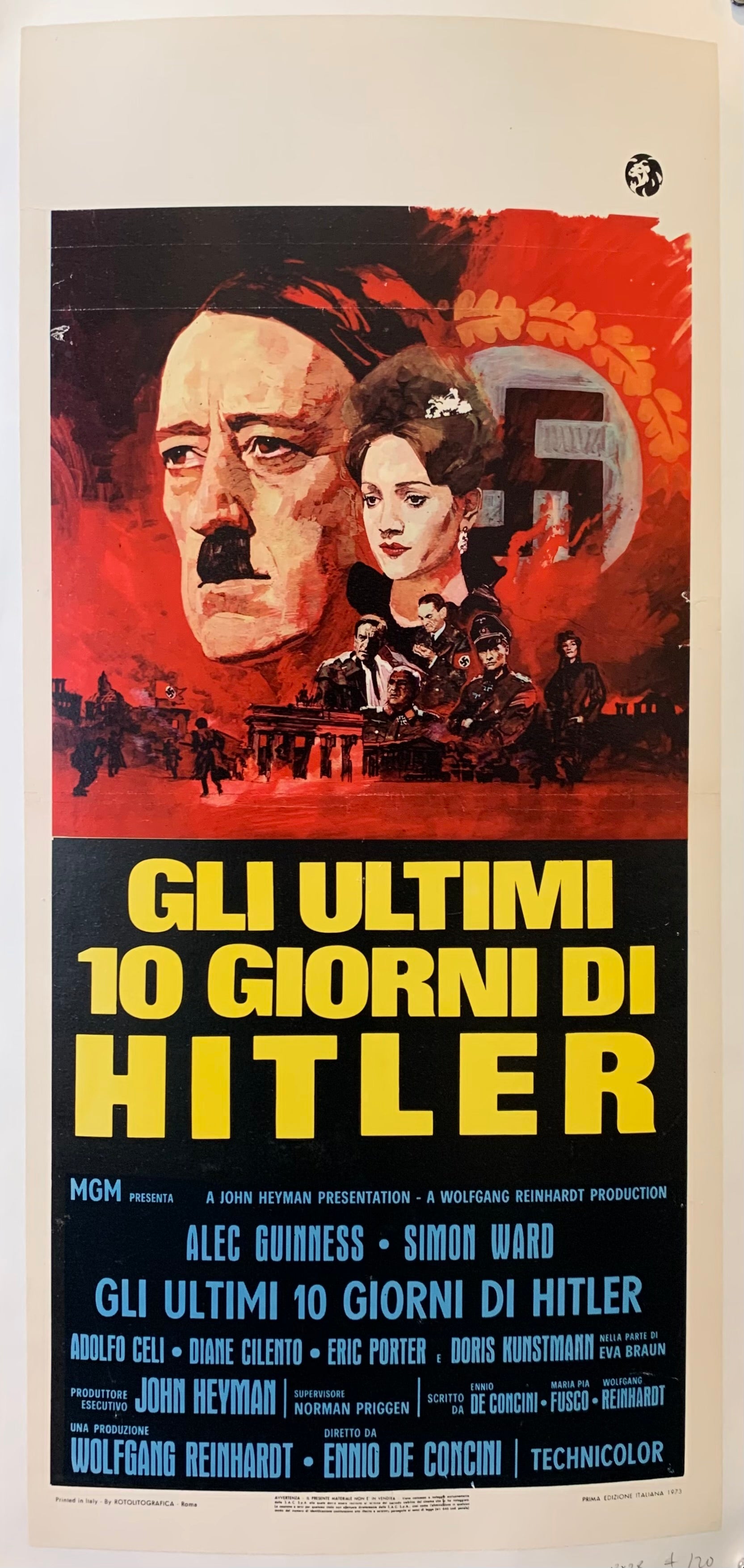 Movie poster with bold yellow and blue text. Photo of Hitler and a swastika are on the top. 